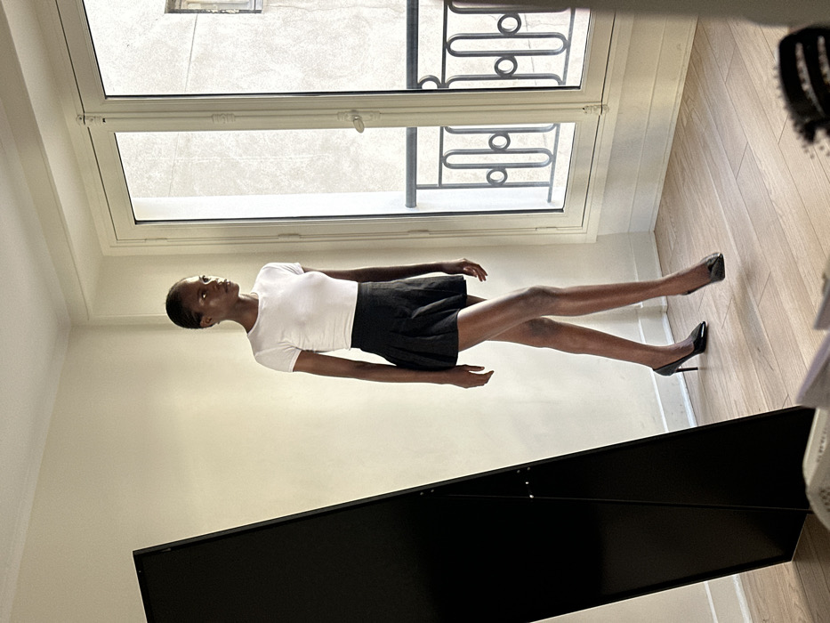 Woman documented in Parisian apartment interior scenes