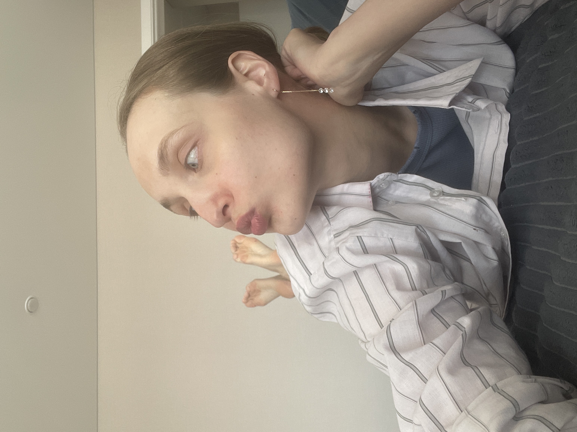 Woman resting indoors during midday in Sepych, Russia