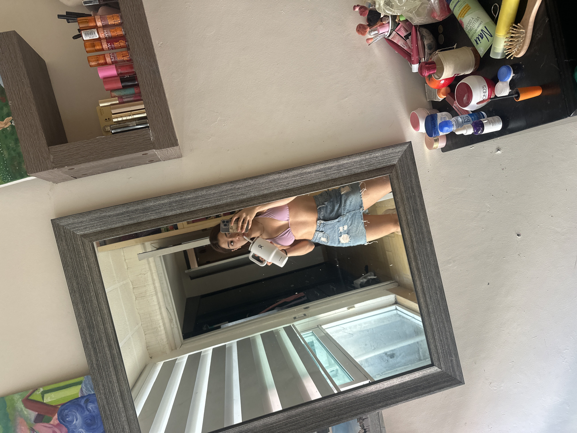 Woman takes mirror selfie in pink bikini, Puebla