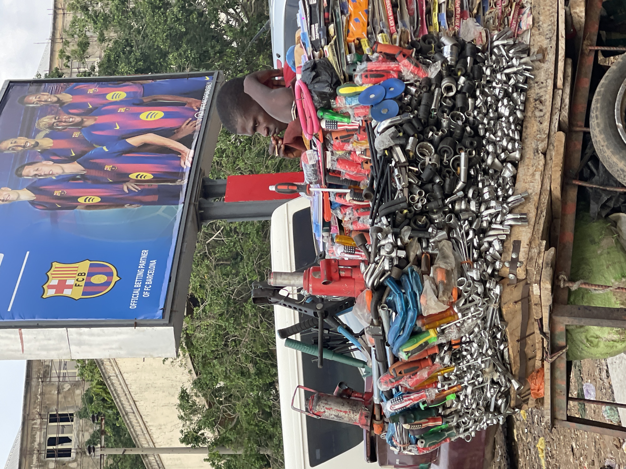 Street commerce and daily movement in central Abuja