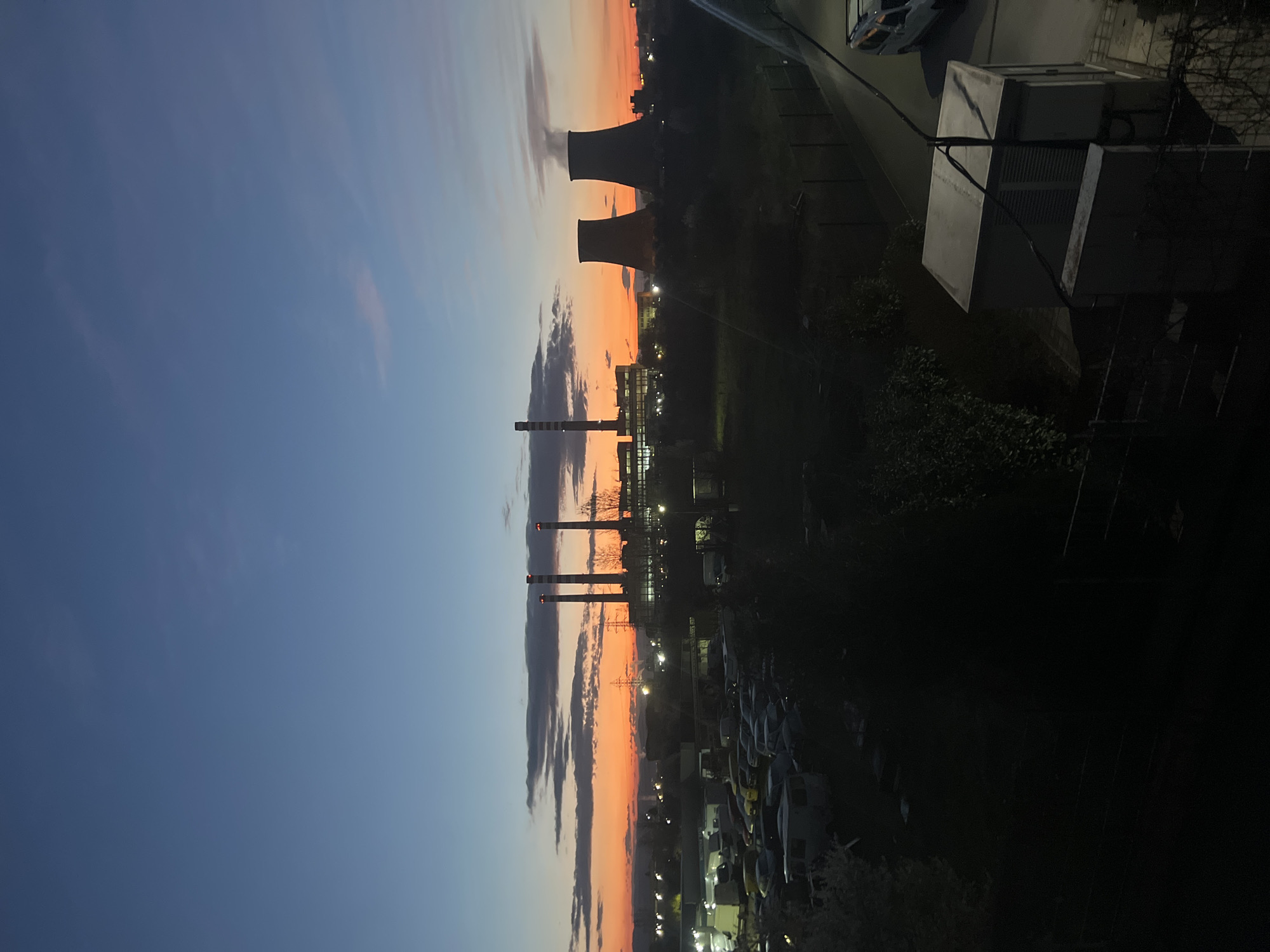 Industrial area with smokestacks observed at dusk in Sofia