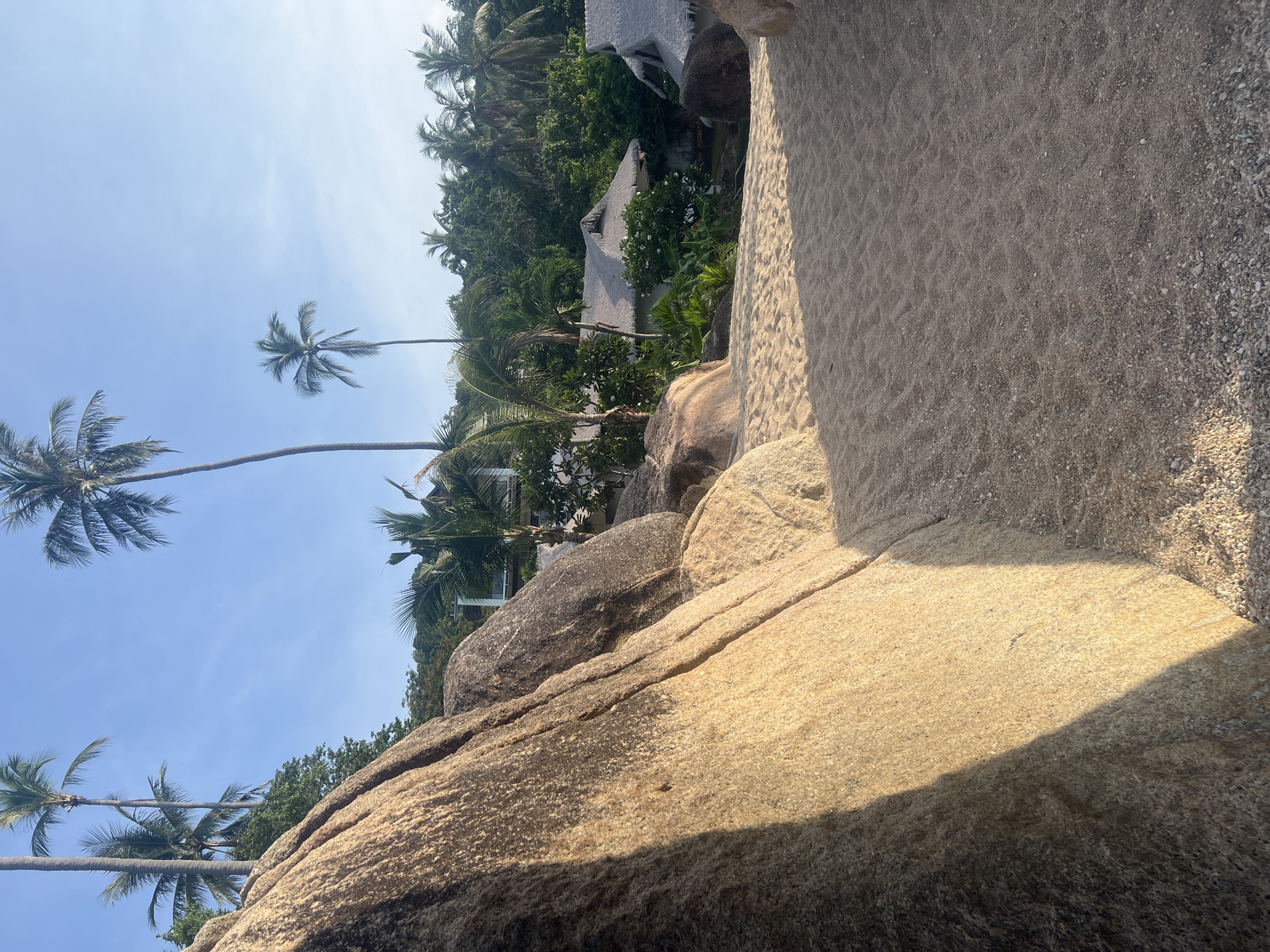 Ko Samui granite coastline on a calm tropical morning