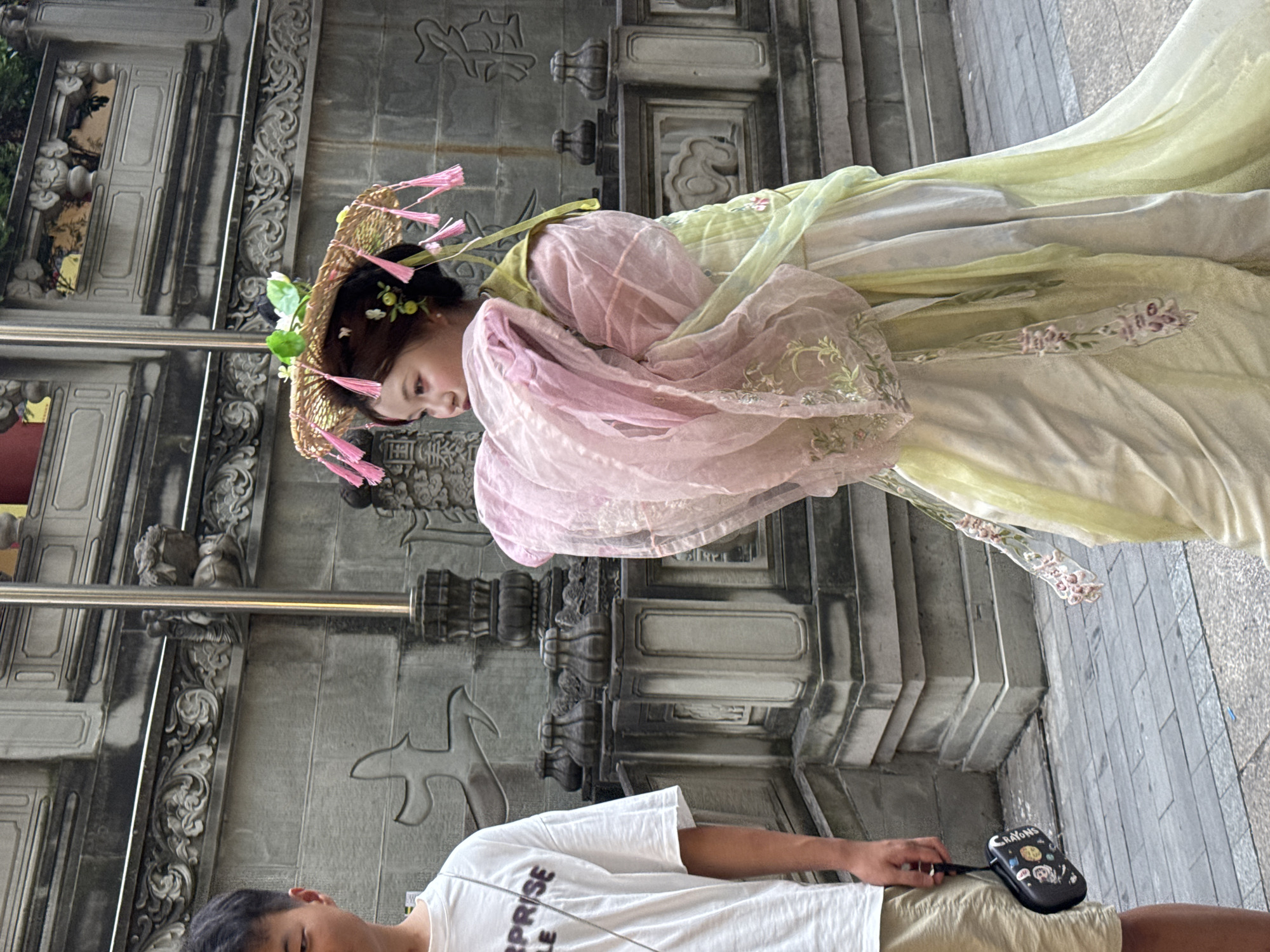 Hanfu and street fashion outside a Chinese Fashion storefront in Yuzhong