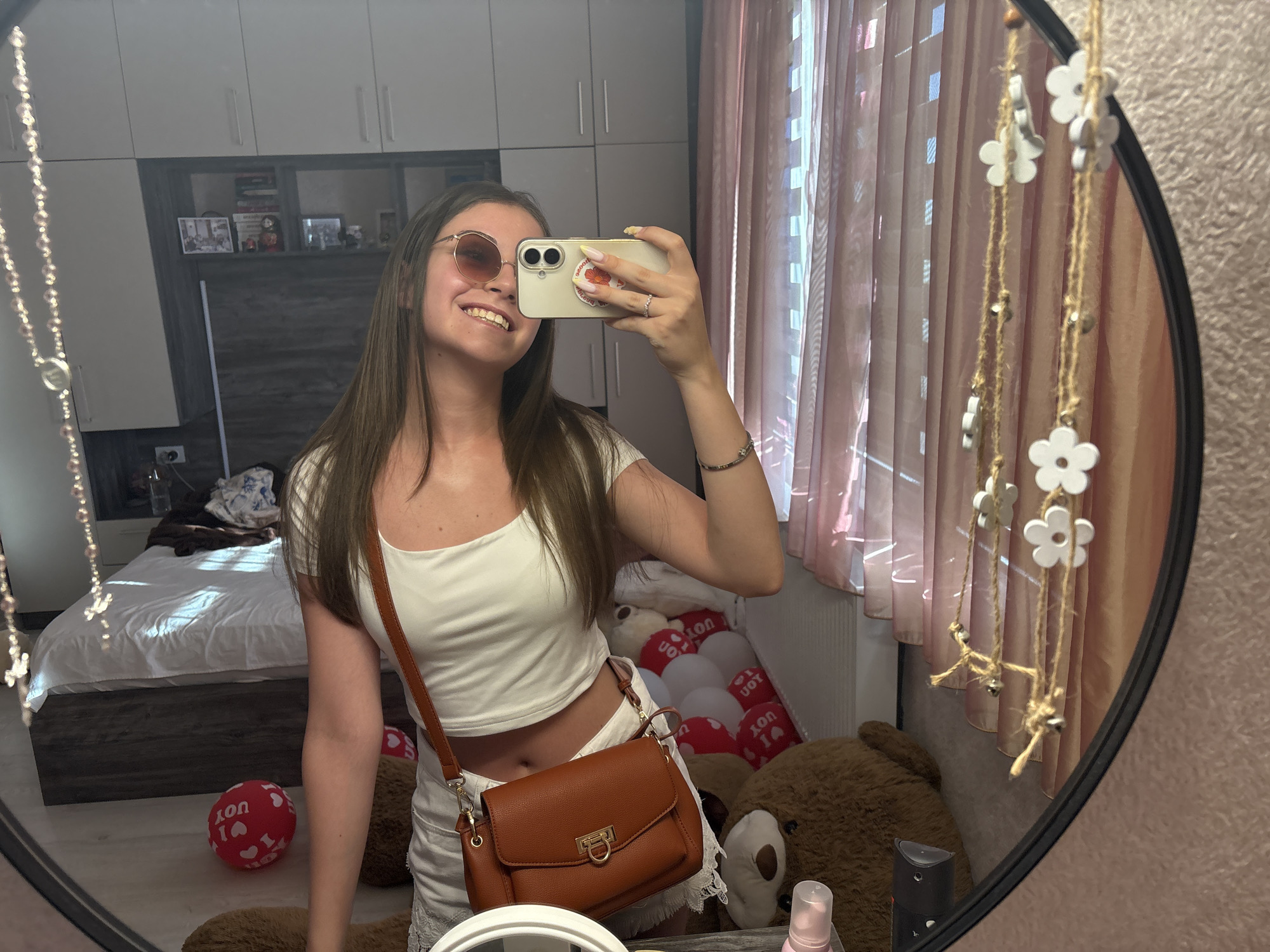 Mirror selfie in a Bulgarovo bedroom, travel outfit ready