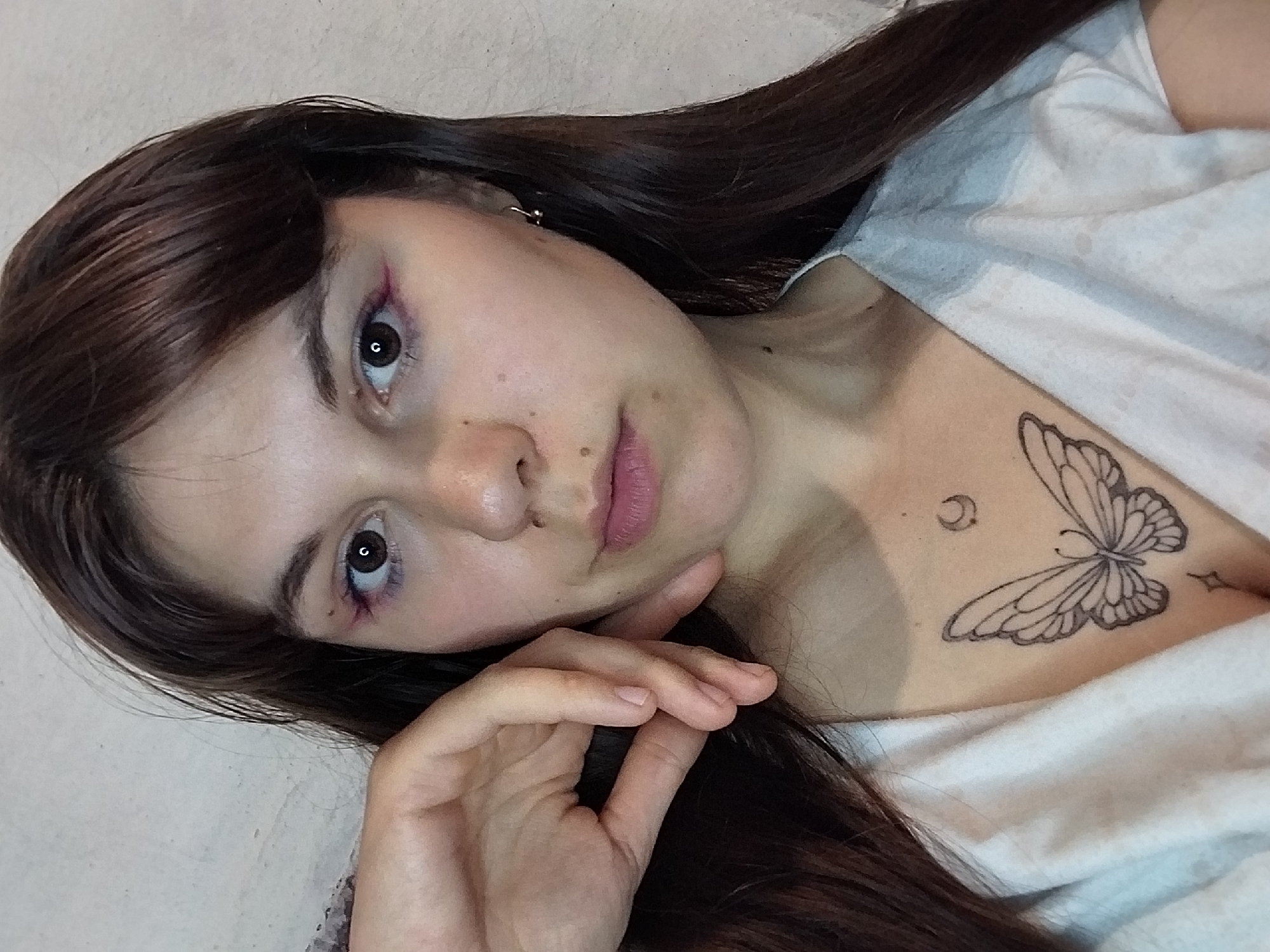 Close-up selfie series, same person, slight outfit variation