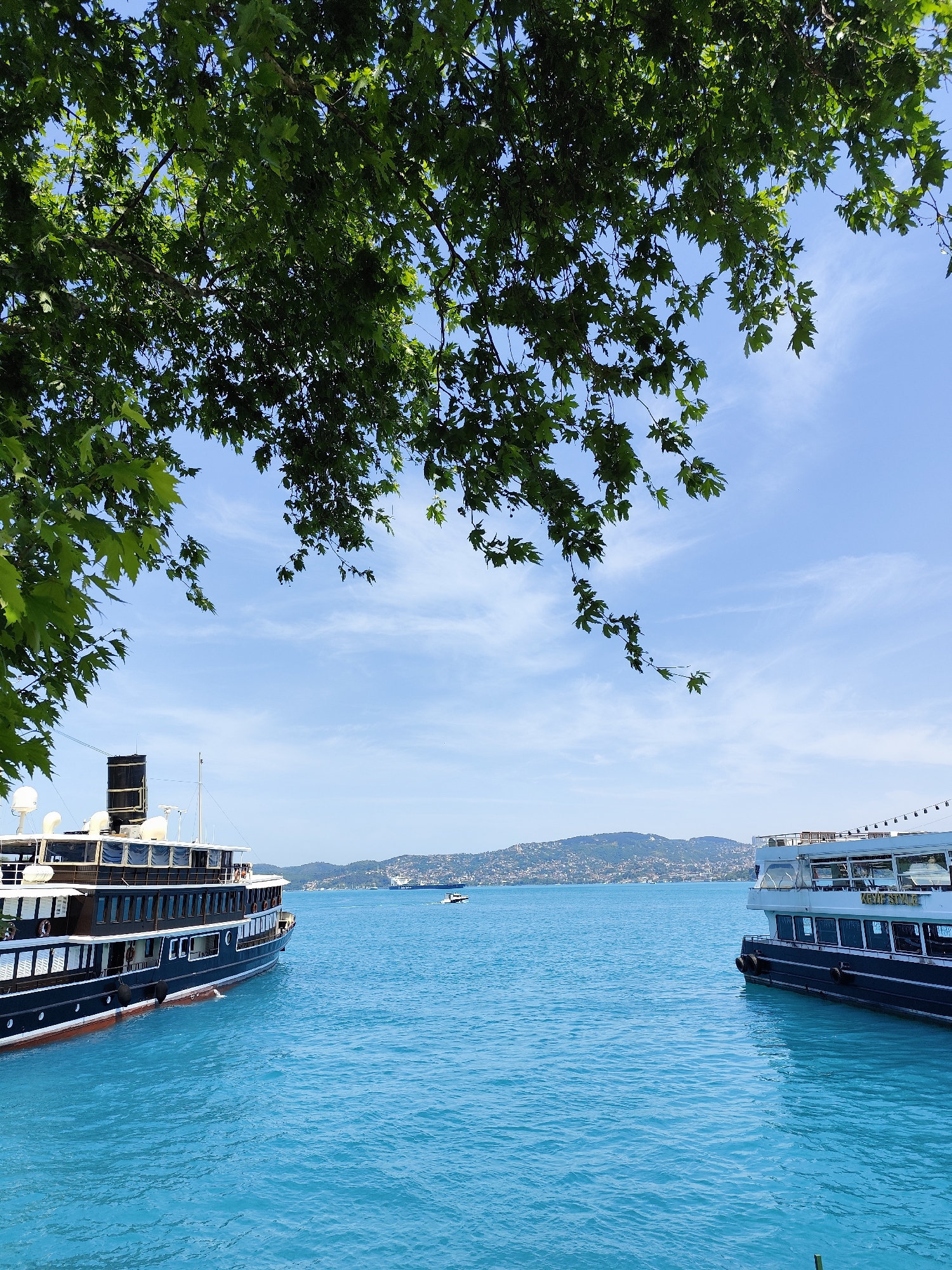 Sunny morning stroll documented along Bosphorus waterfront in Istanbul