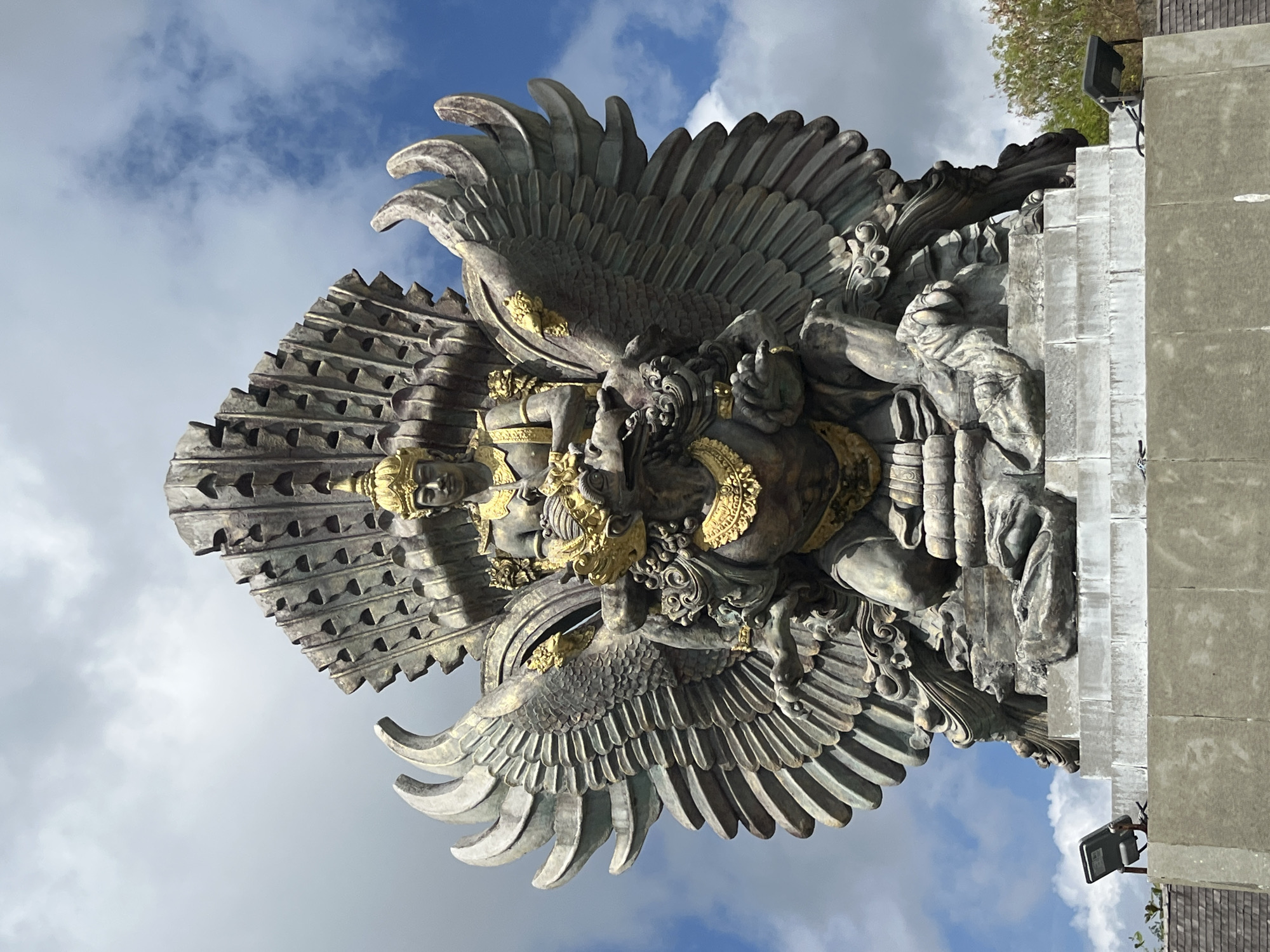 Tourist documents Garuda Wisnu Kencana statue complex in Bali