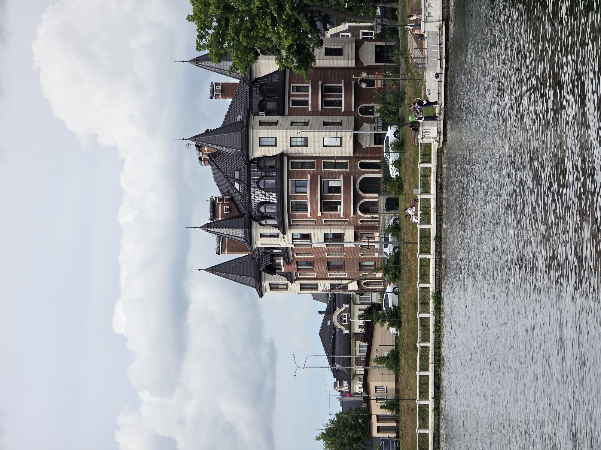 Tourist documents Kaliningrad landmarks and architecture during afternoon walkabout