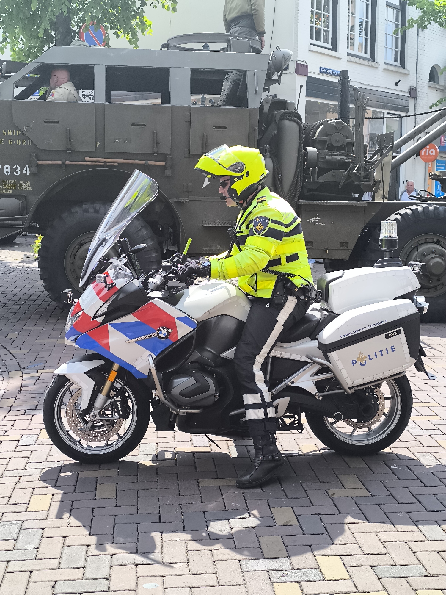 Canadian military convoy escorts through Alkmaar streets