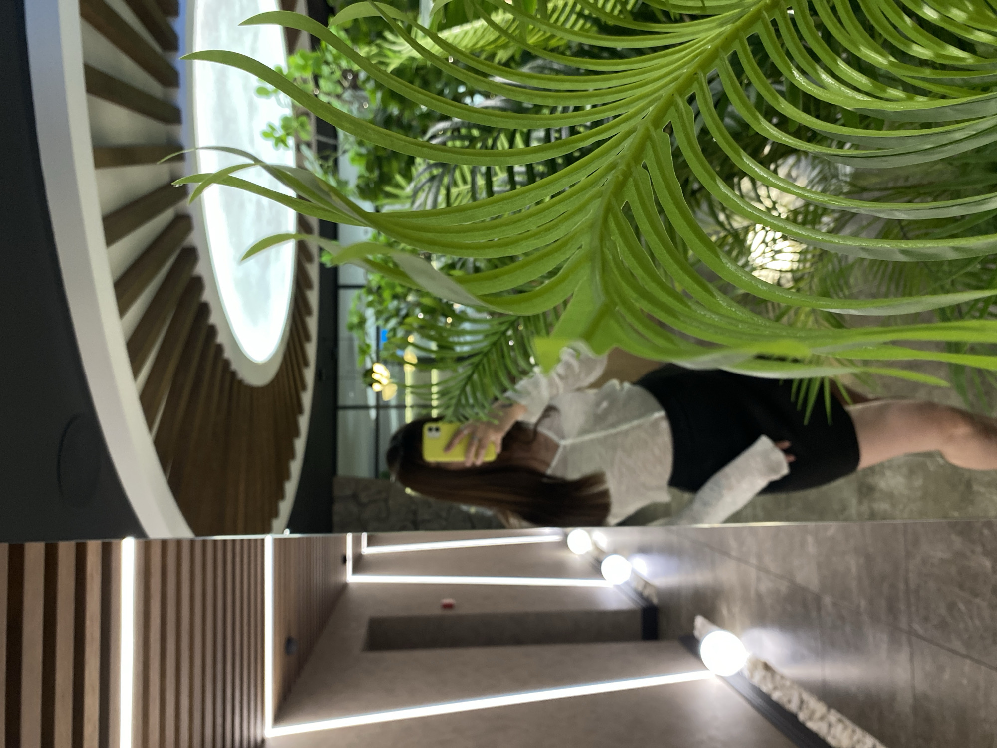 Mirror selfies inside a sleek Votkinsk boutique space