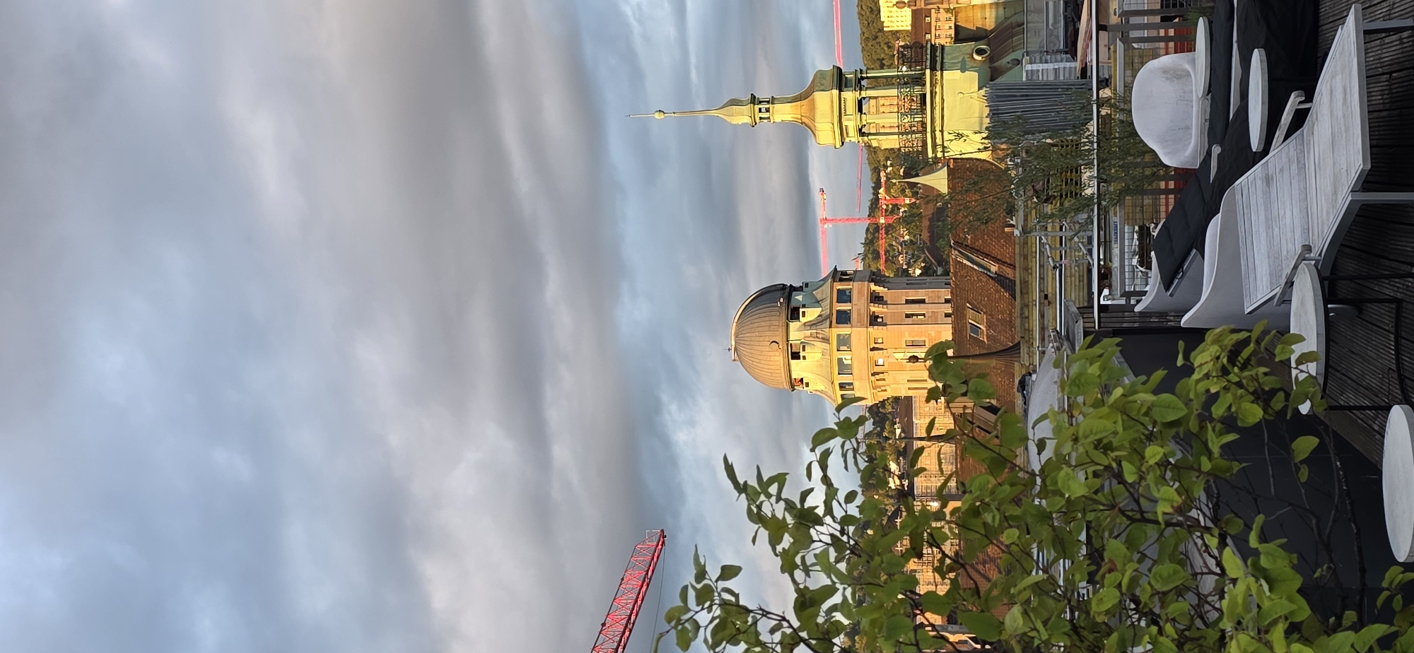 Evening cityscape views captured across European city rooftops