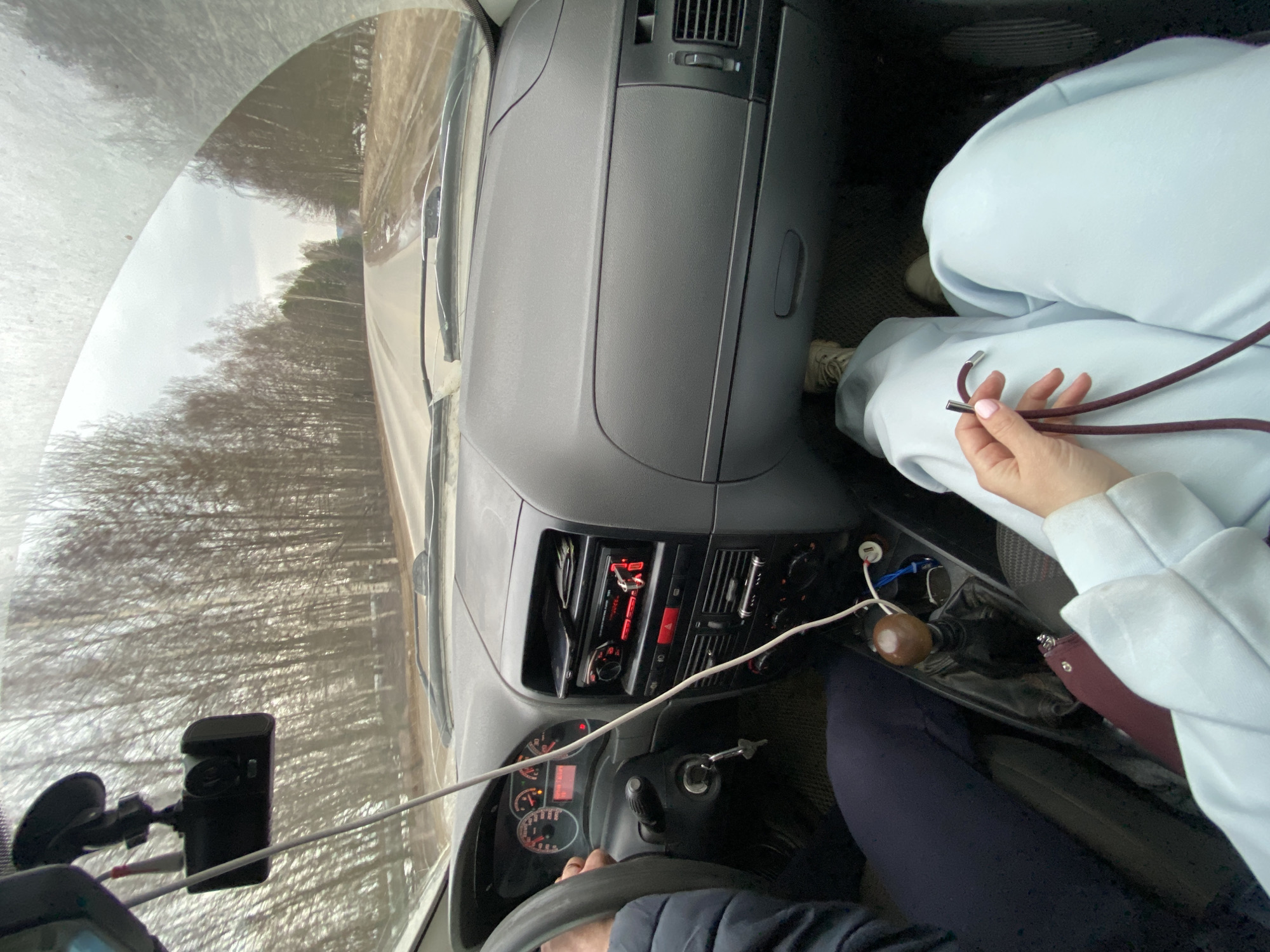 Two people travel by car in Ol'khovskoye, Russia