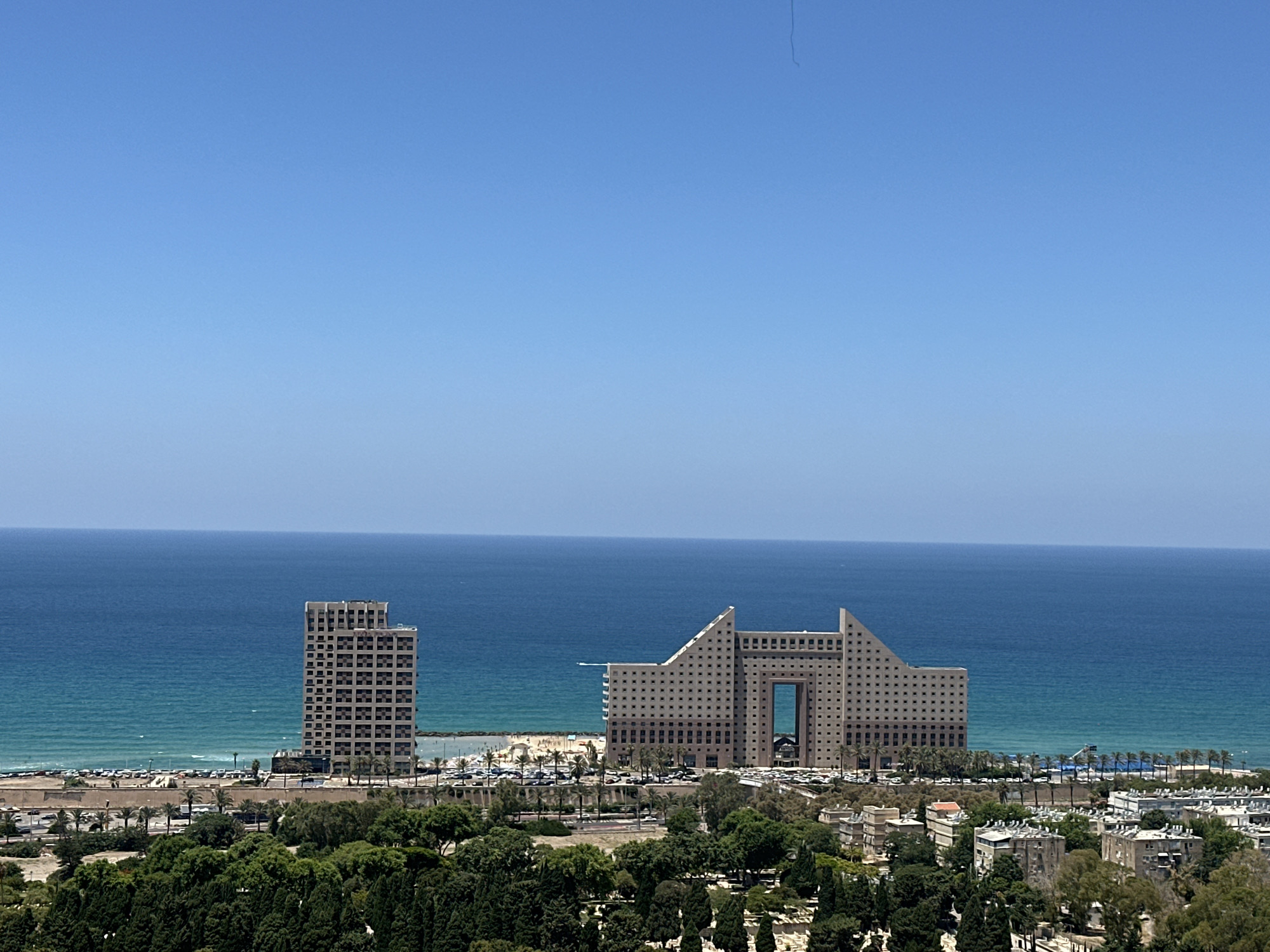 A quiet July morning across Haifa's coast and streets
