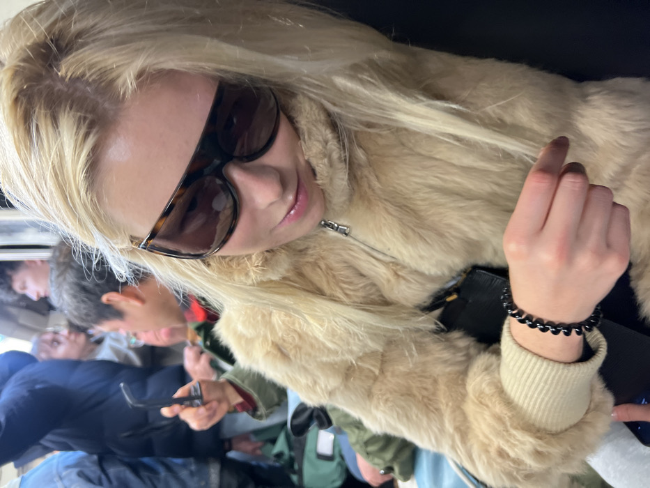 Blonde woman in fur coat spotted in Paris