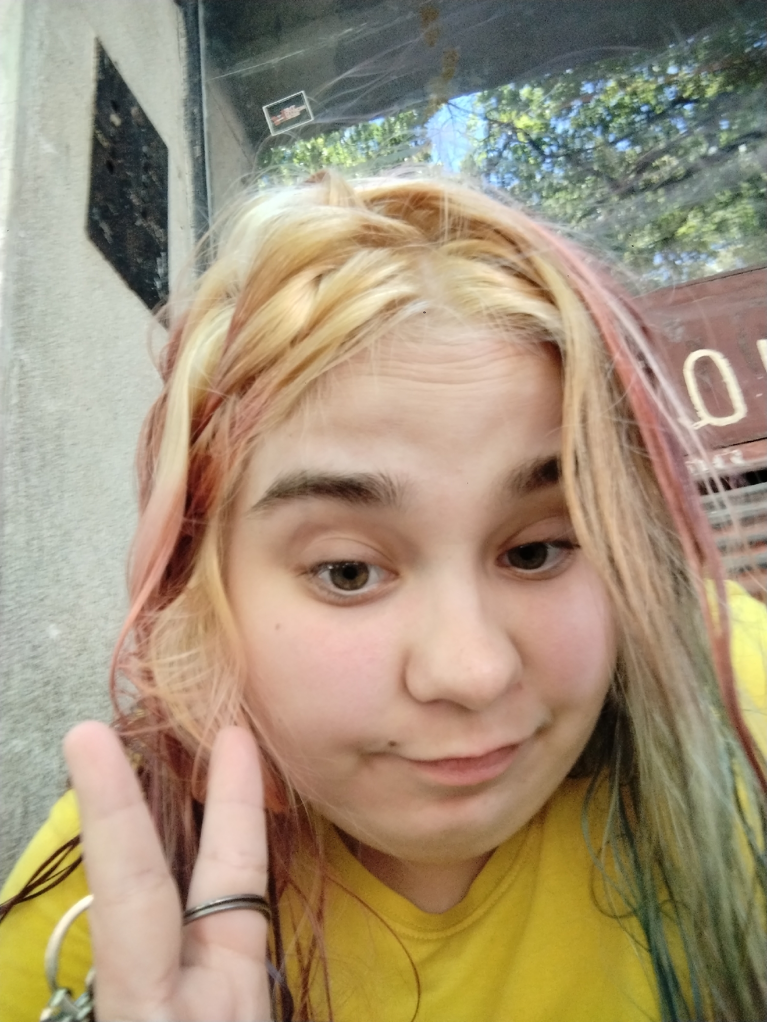 Young person documents colorful hair transformation in Plovdiv selfies