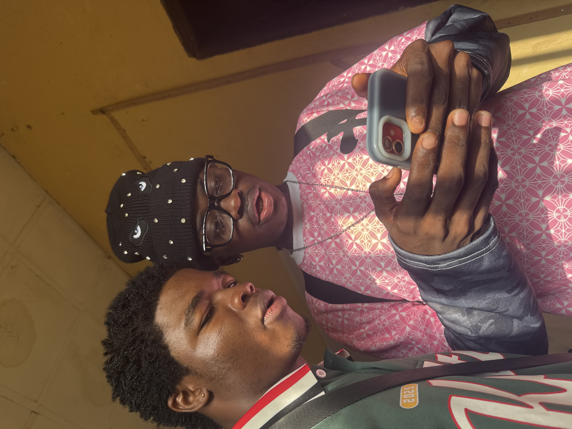 Young men gather, take selfies in Ihiagwa, Nigeria