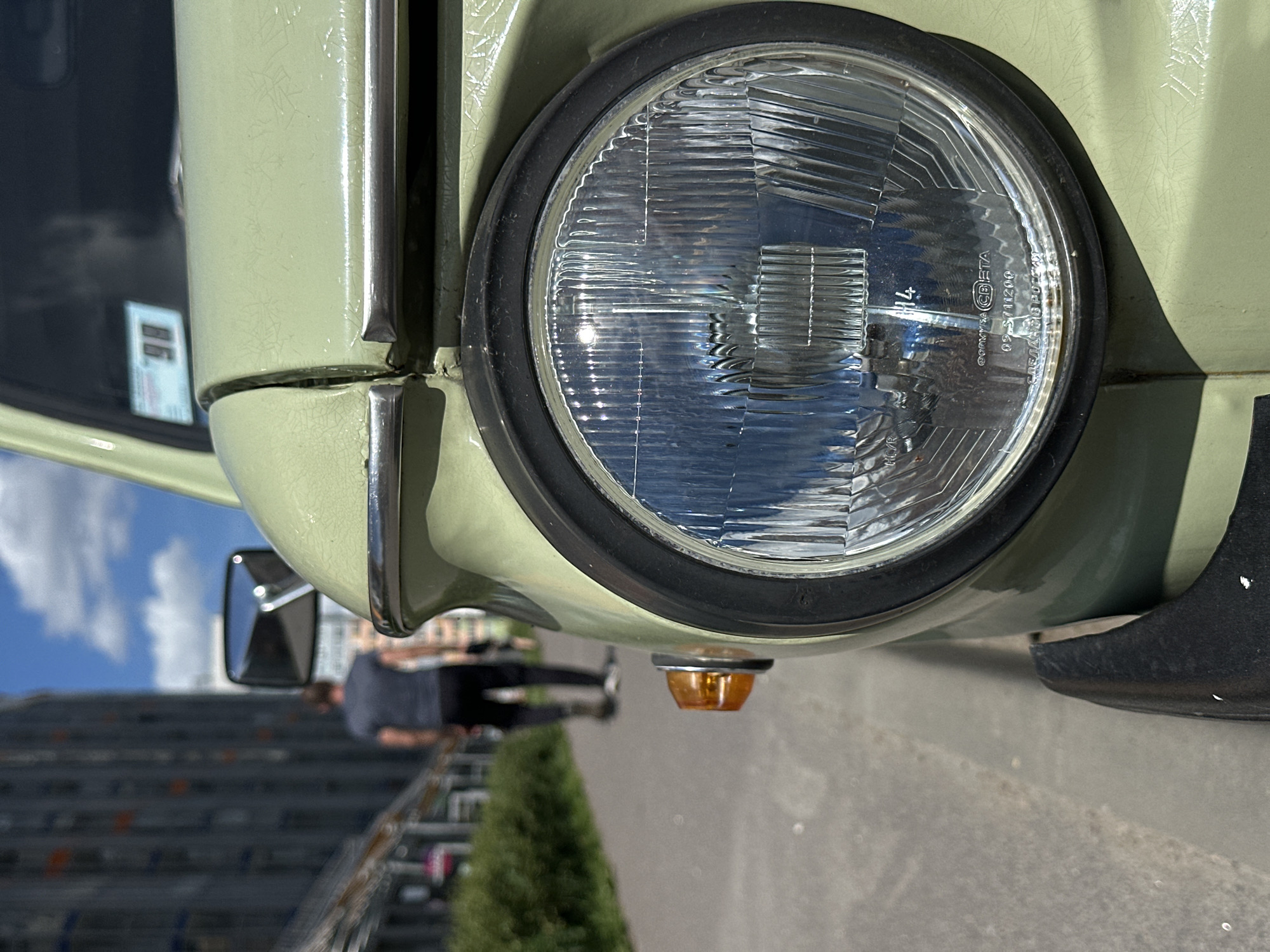 Weathered Soviet-era car parked on a Murino street