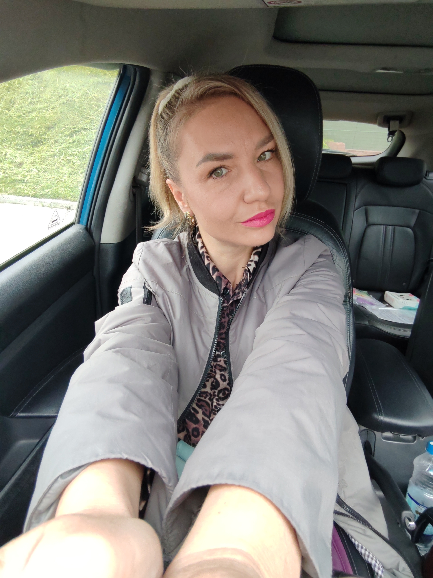 Car selfie series, leopard print and pink lipstick