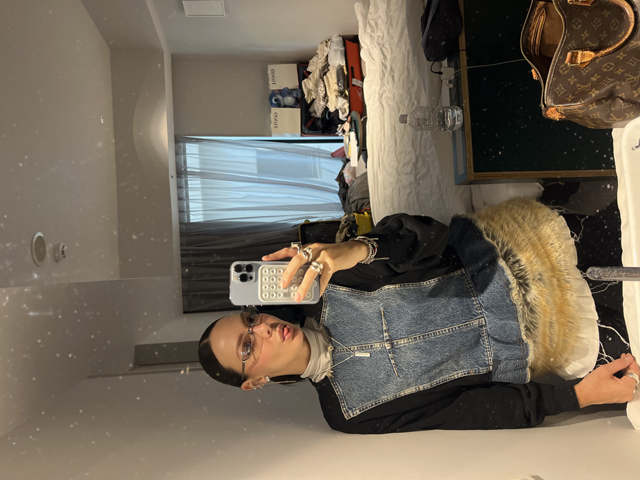 Late-night selfie captured in Shibuya mirror