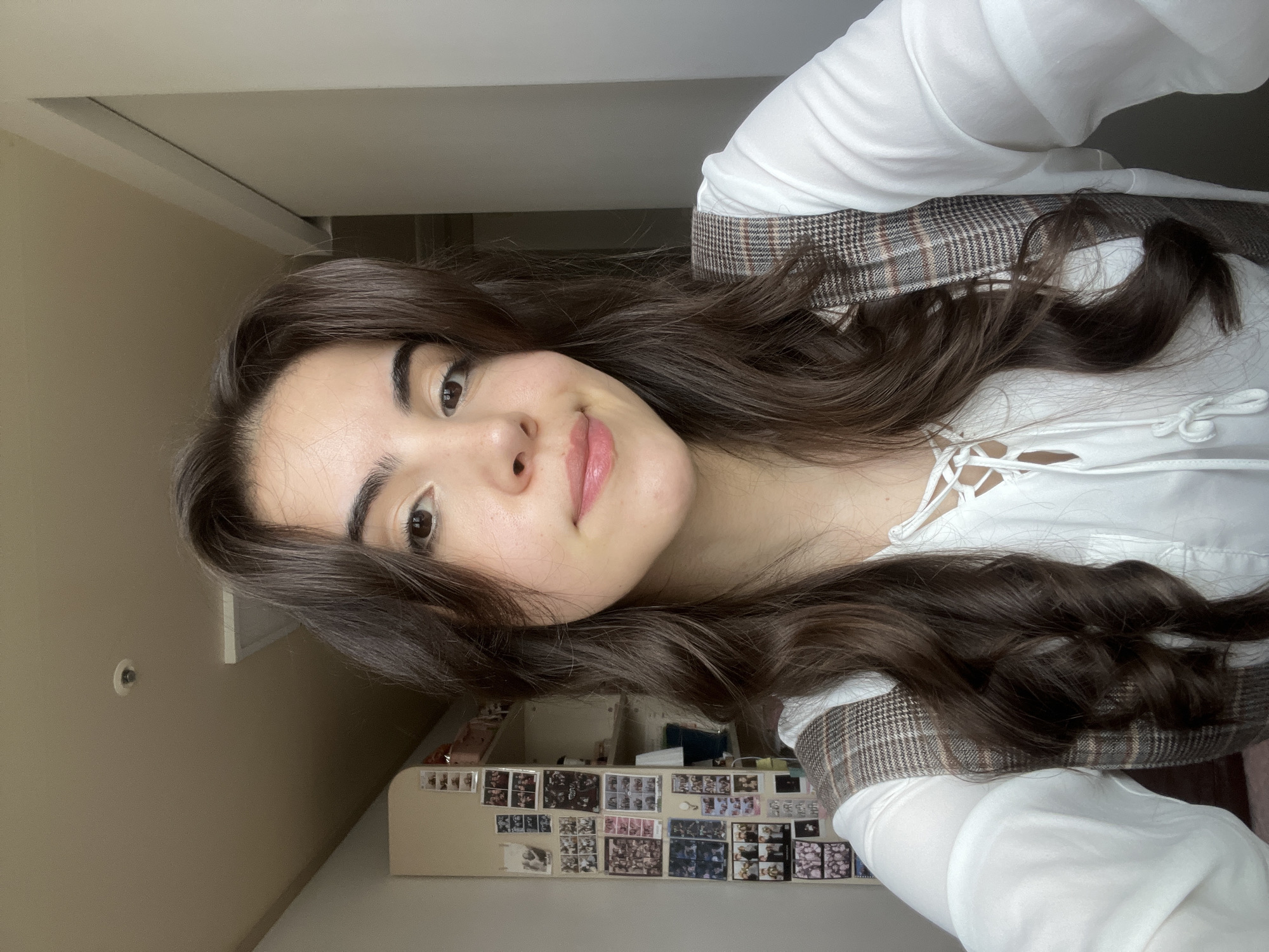 Woman takes selfies indoors in Daegu, South Korea