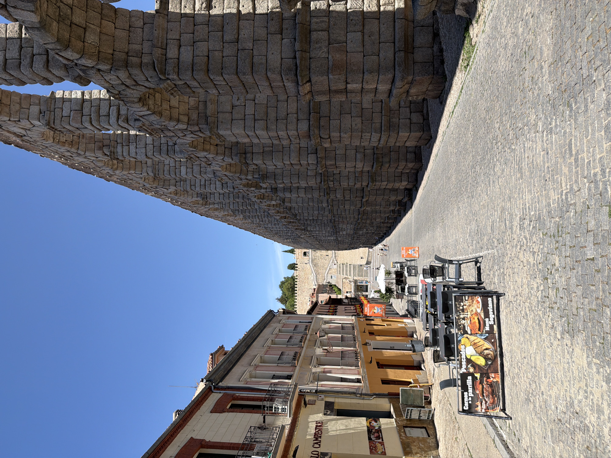 Morning walk through Segovia's Roman aqueduct and historic landmarks