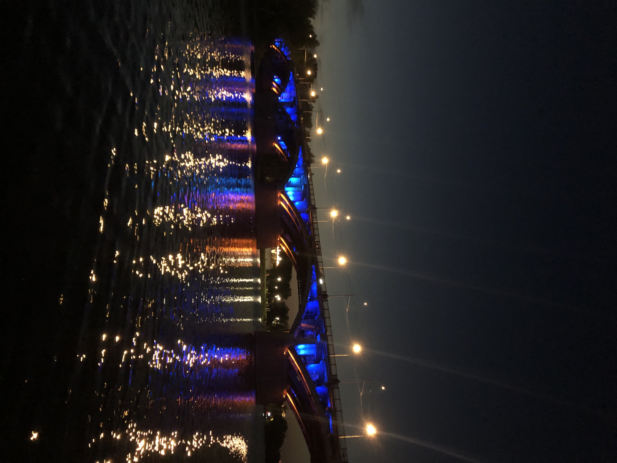 Nighttime bridge photography session captured along Yenisei River, Krasnoyarsk