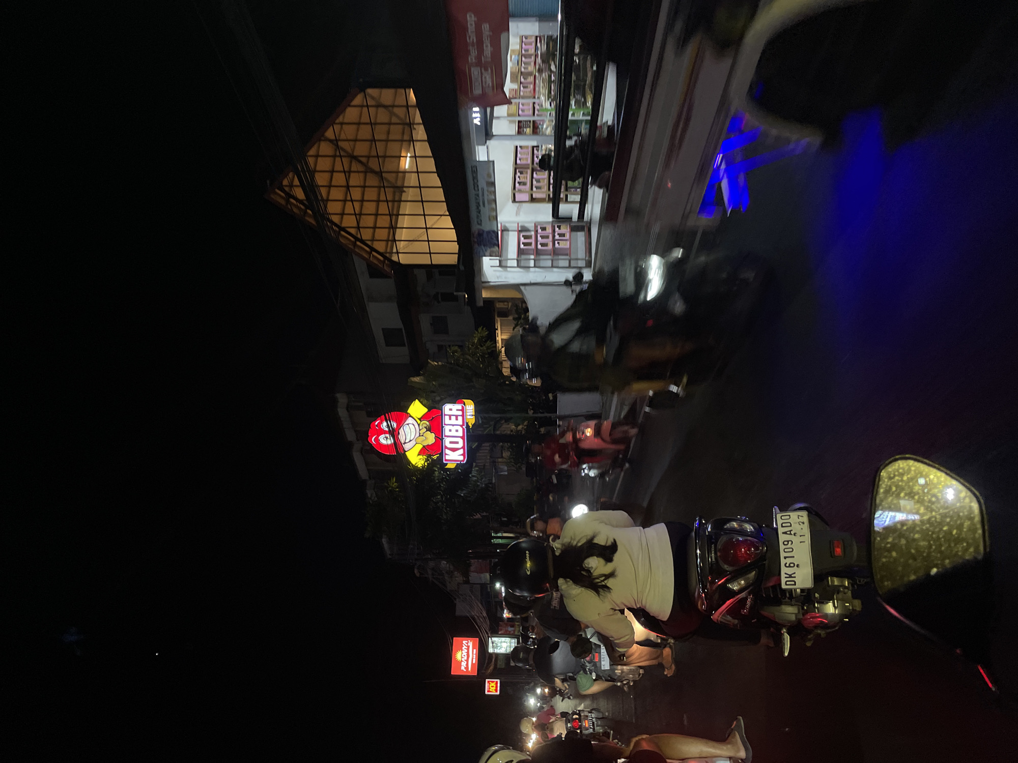 Scooter ride through Denpasar, day to night