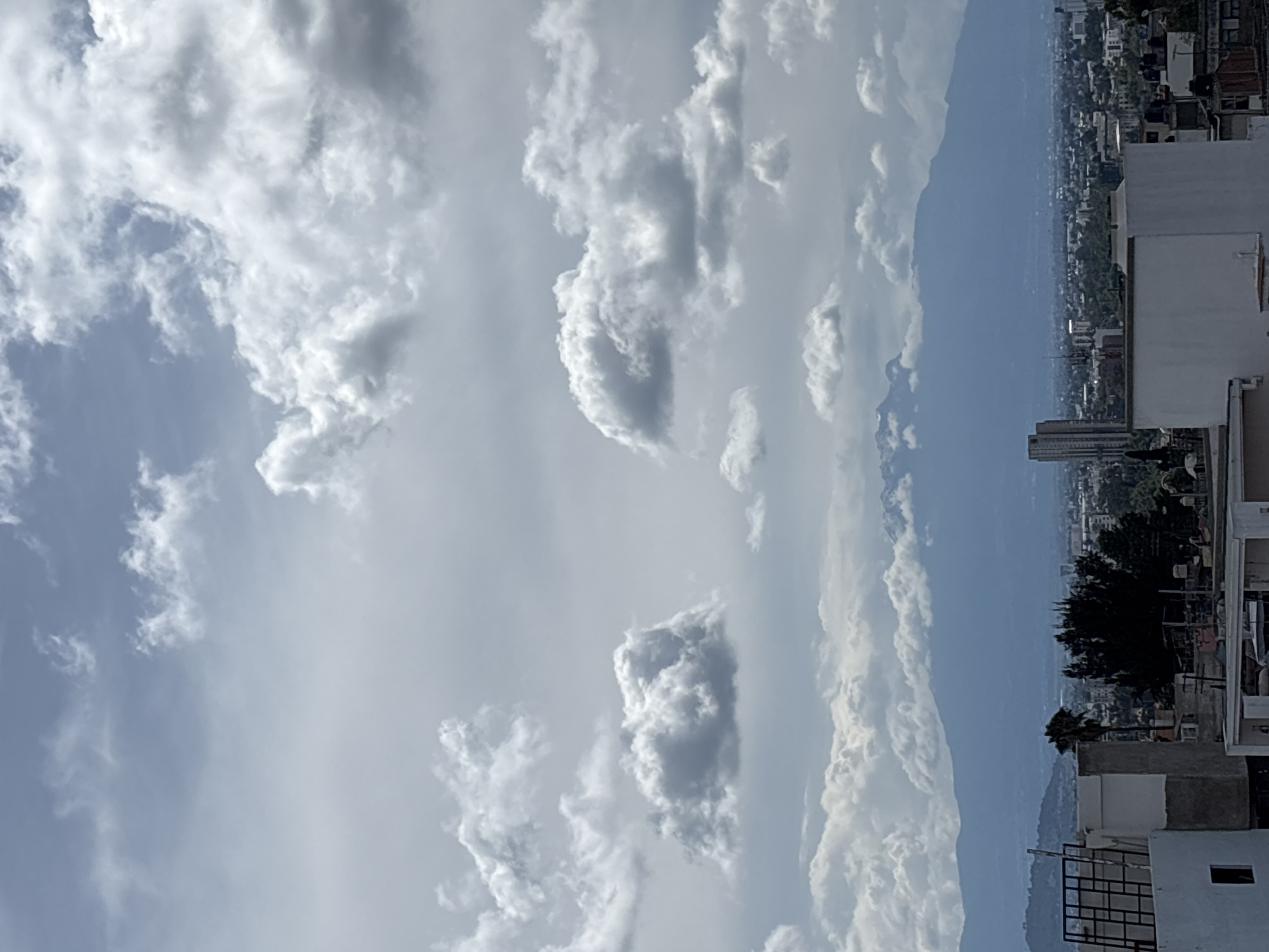 Evening in Puebla, city views and volcano on the horizon