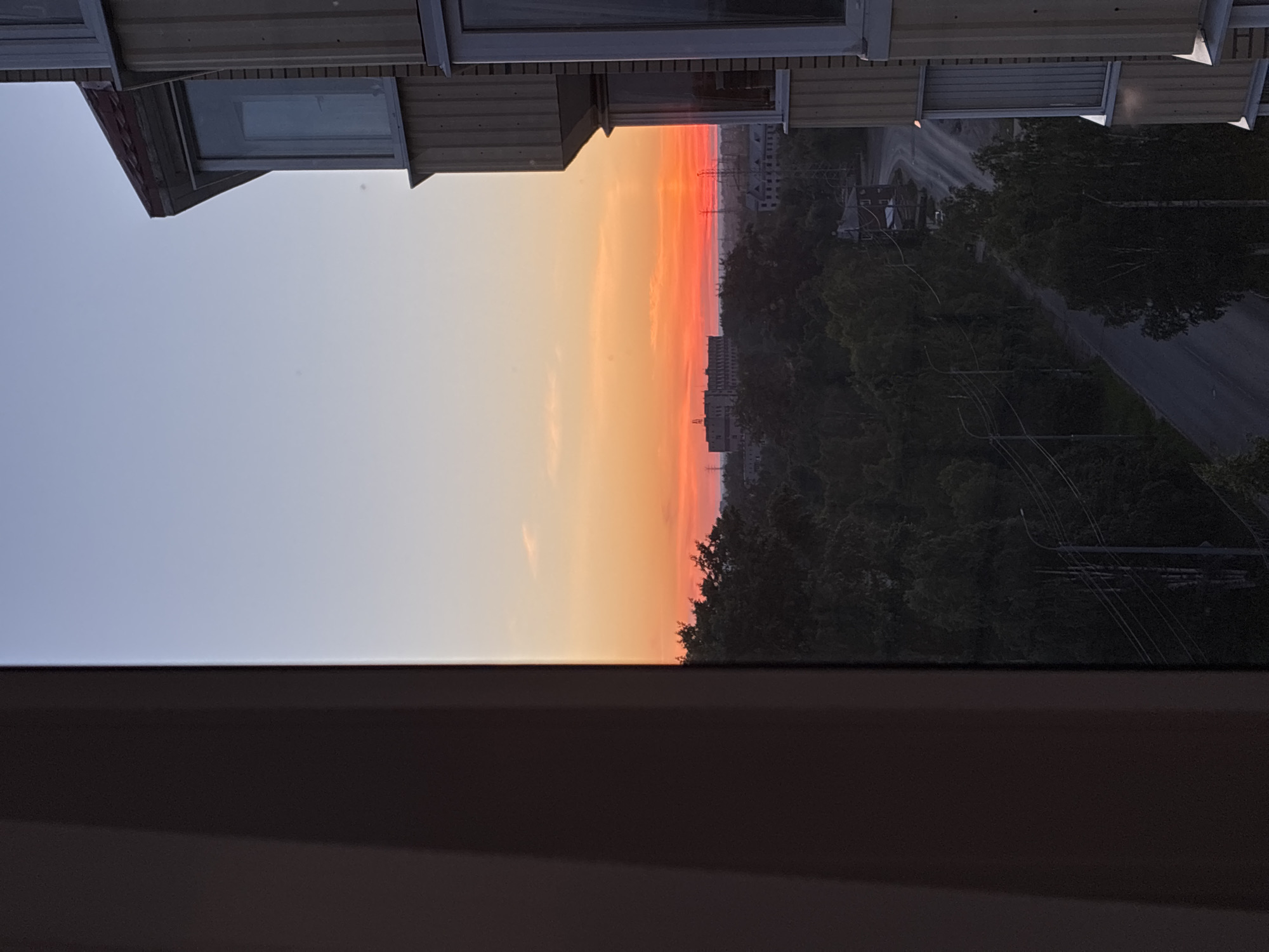 Sunset documented across urban landscape from multiple viewpoints