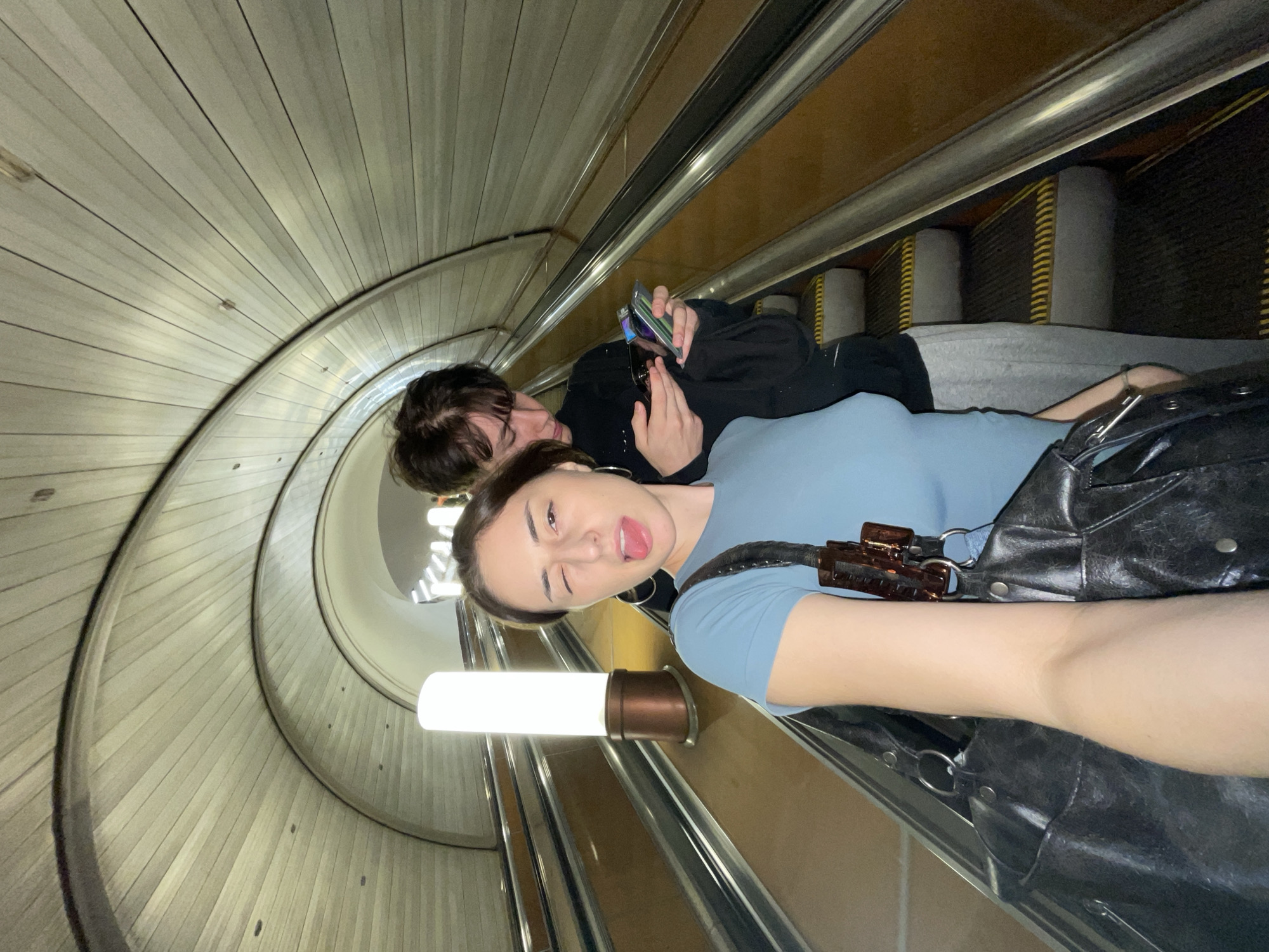Playful escalator selfie in the Moscow Metro