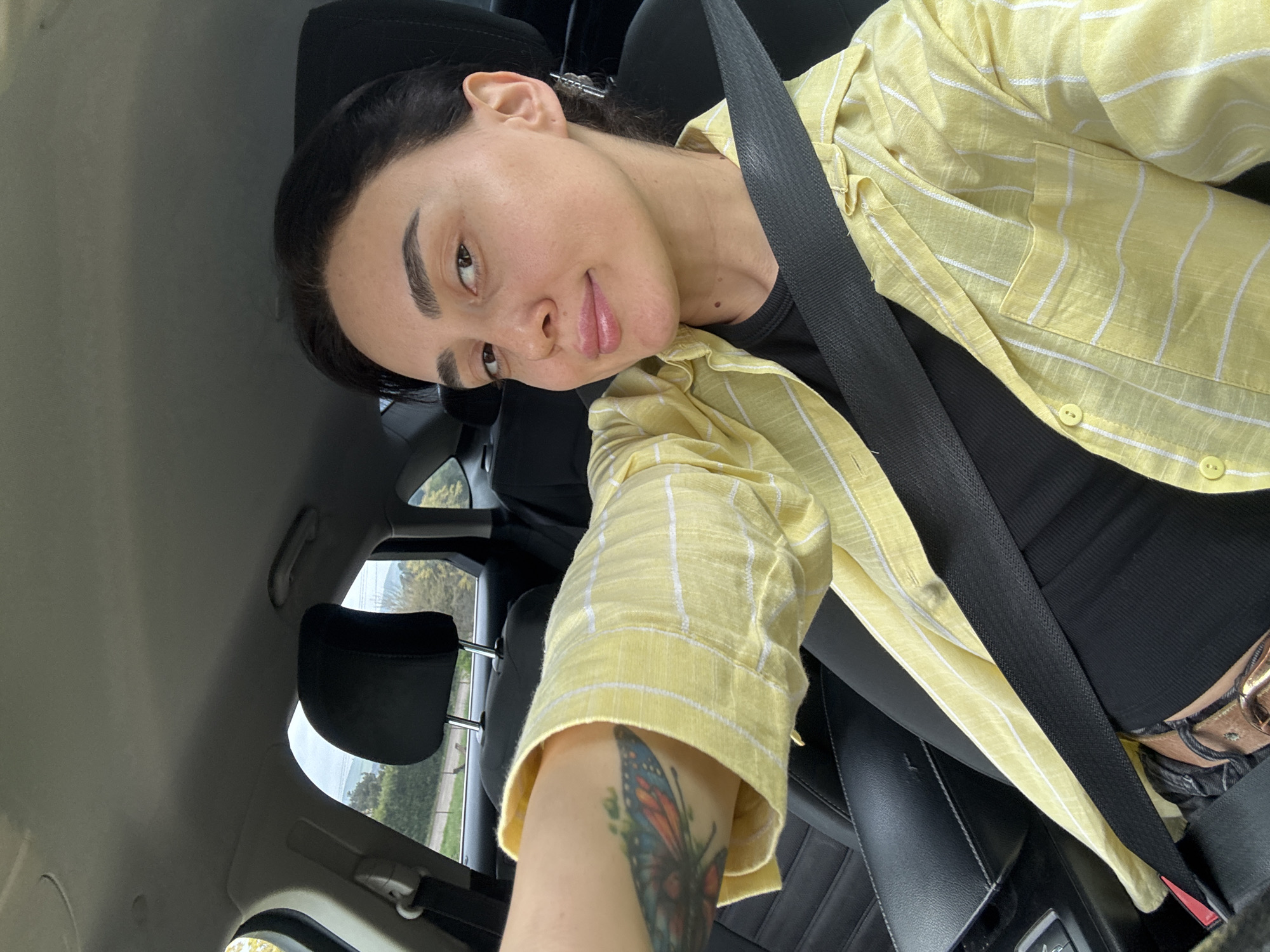 Passenger takes morning selfie in car in Tbilisi