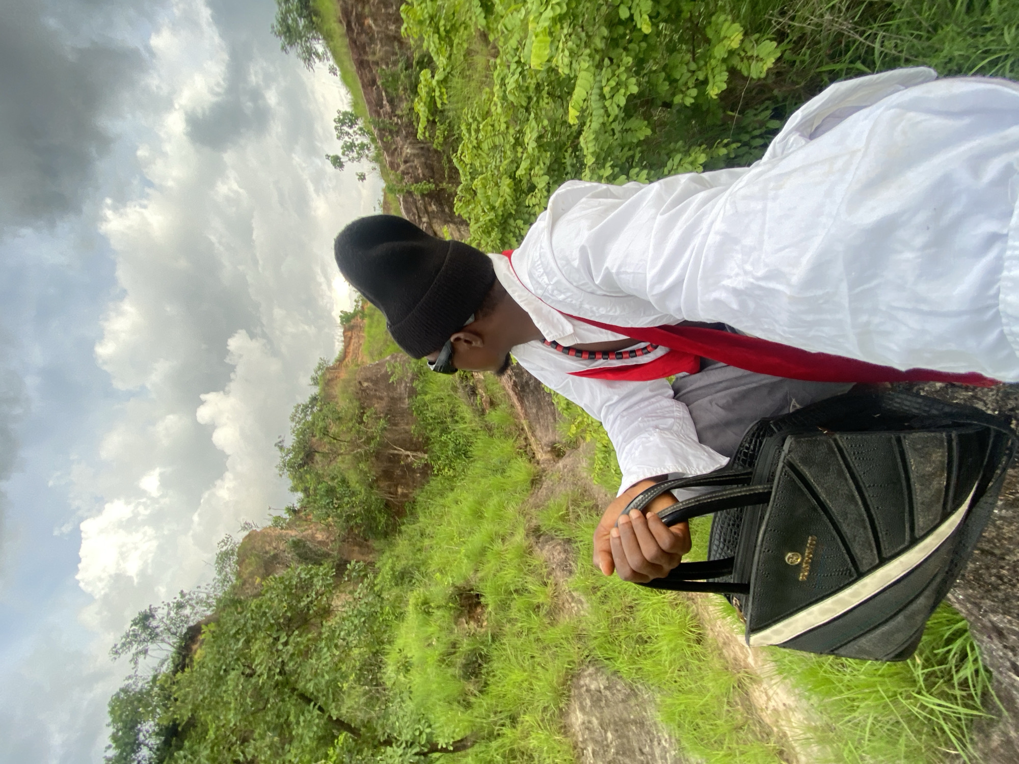 Outdoor photo session captured in Nigerian countryside with nature subjects