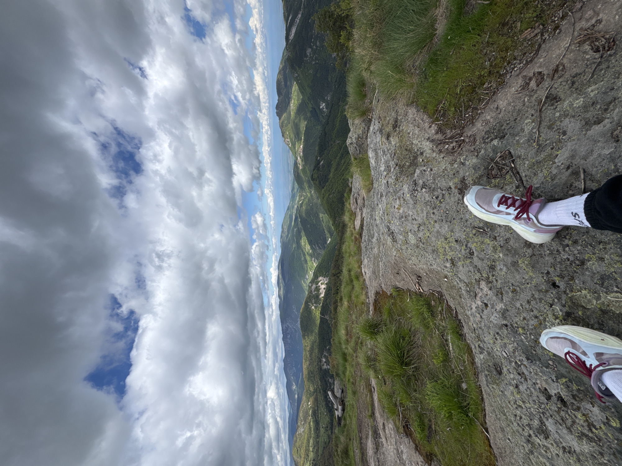 Hikers explore mountain trails near Mostovo, Bulgaria