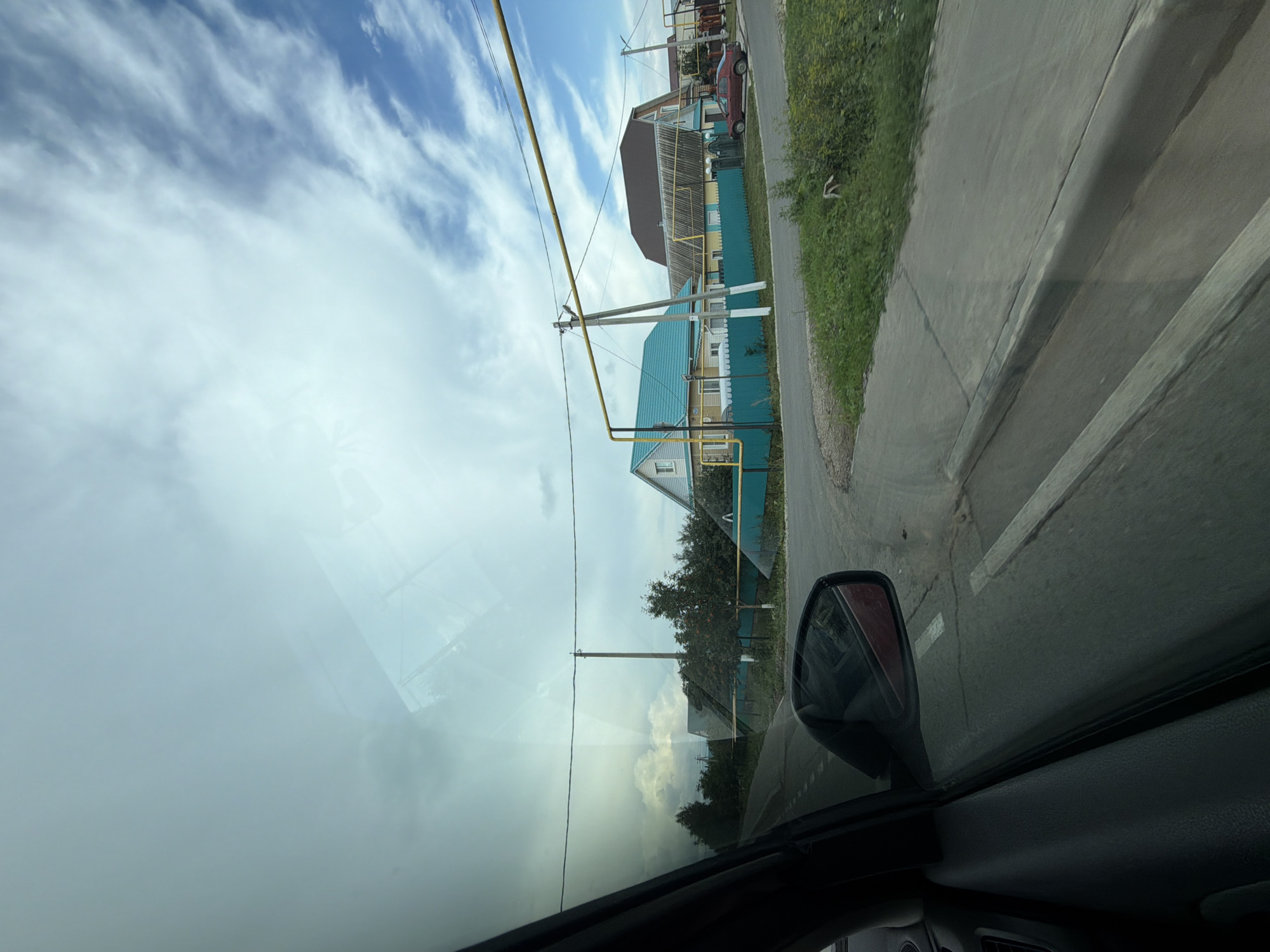 Road trip past a static military helicopter and quiet suburban streets