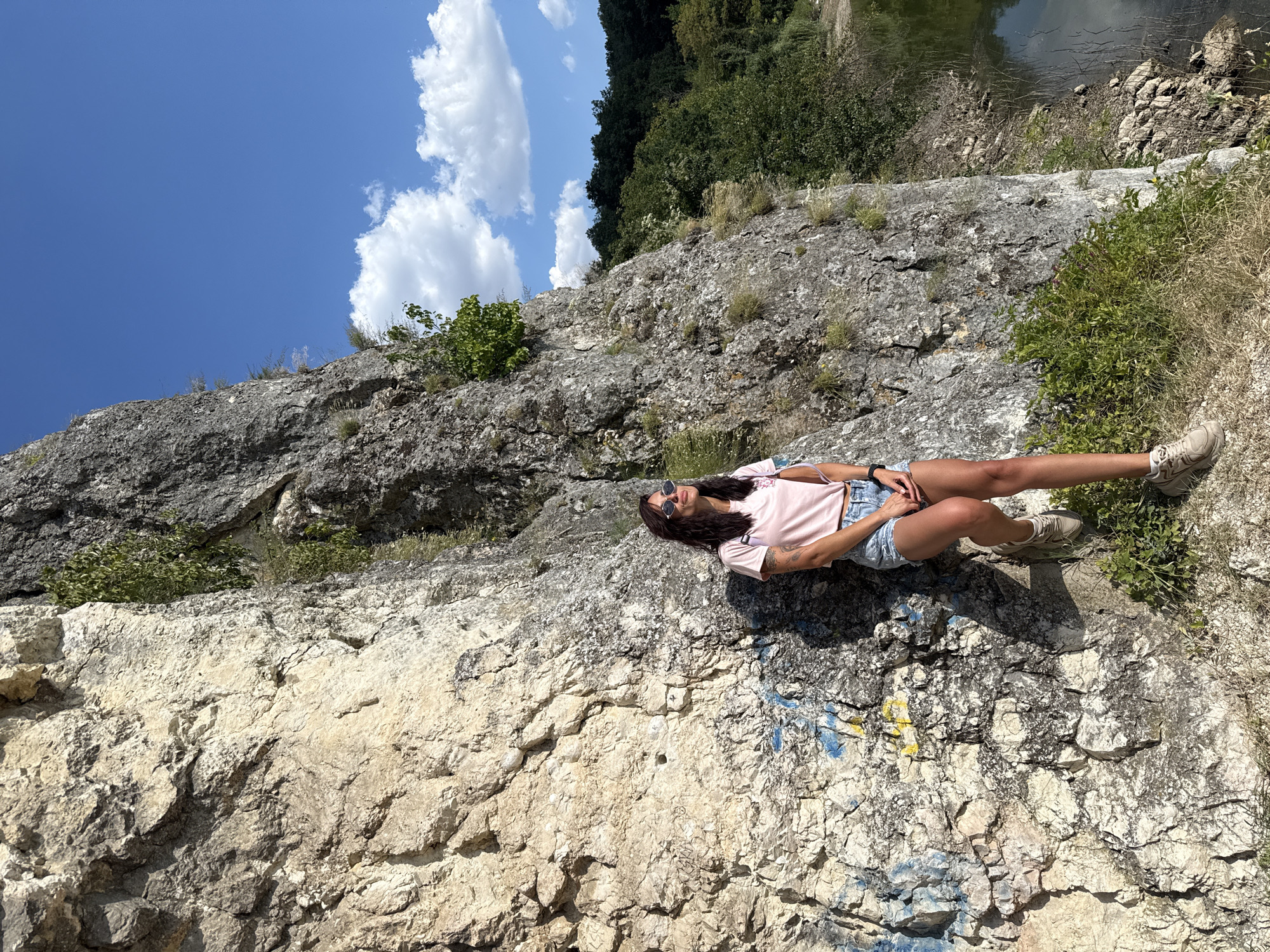 Selfies at a scenic rocky lakeside spot near Pleven, Bulgaria