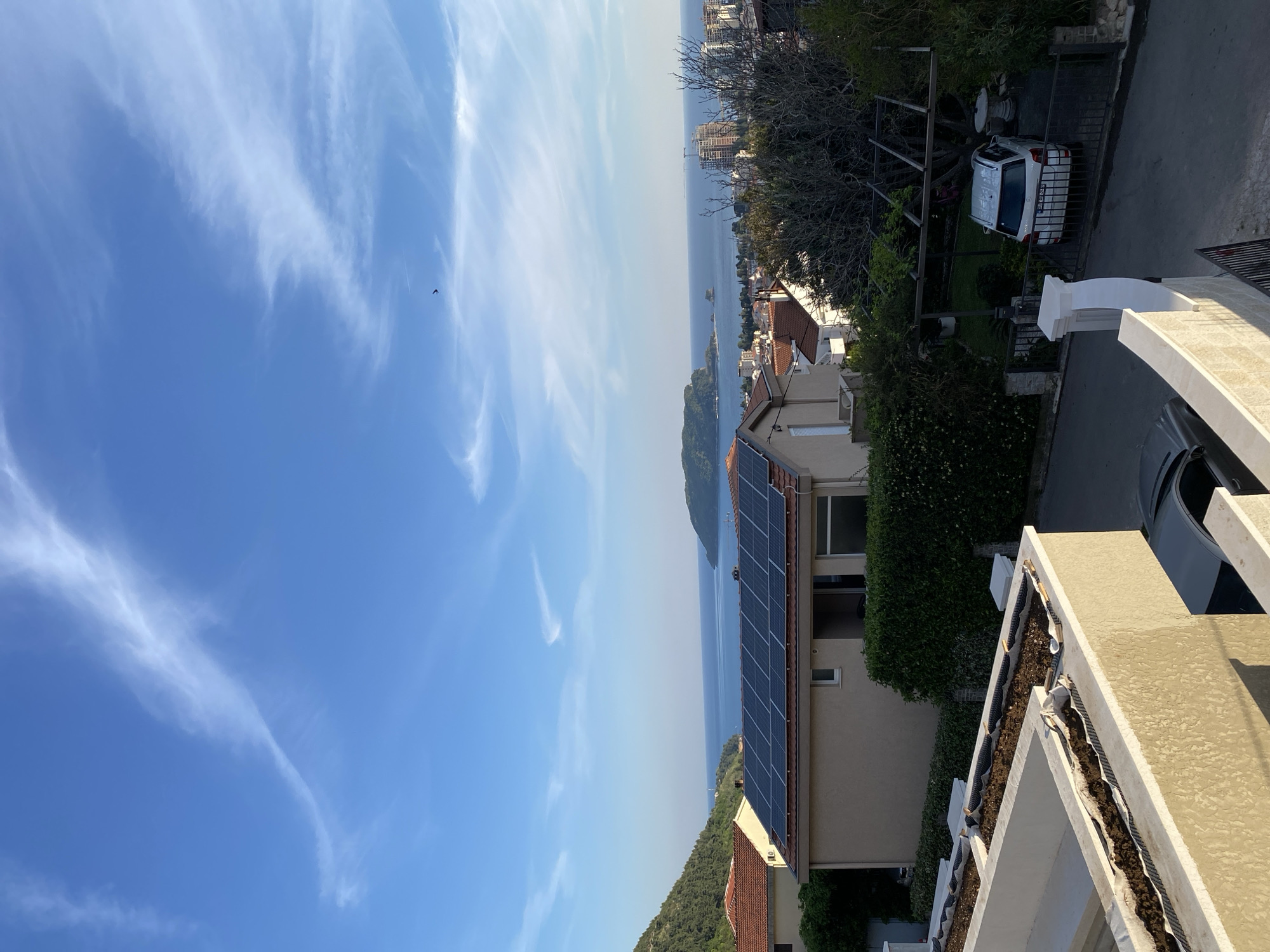 Elevated view captures Budva coastline and residential area