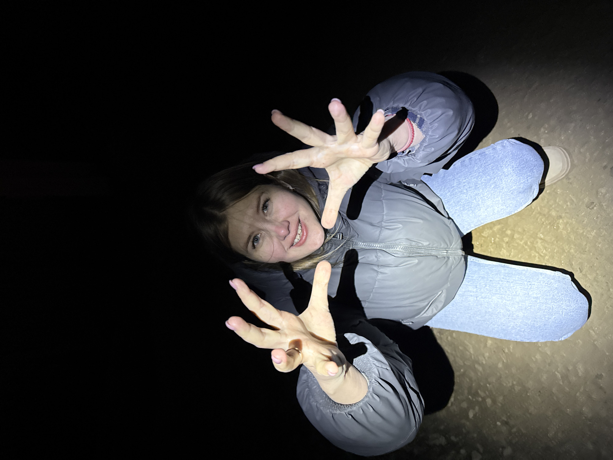 Woman photographed lying on ground in darkness, Горный Russia