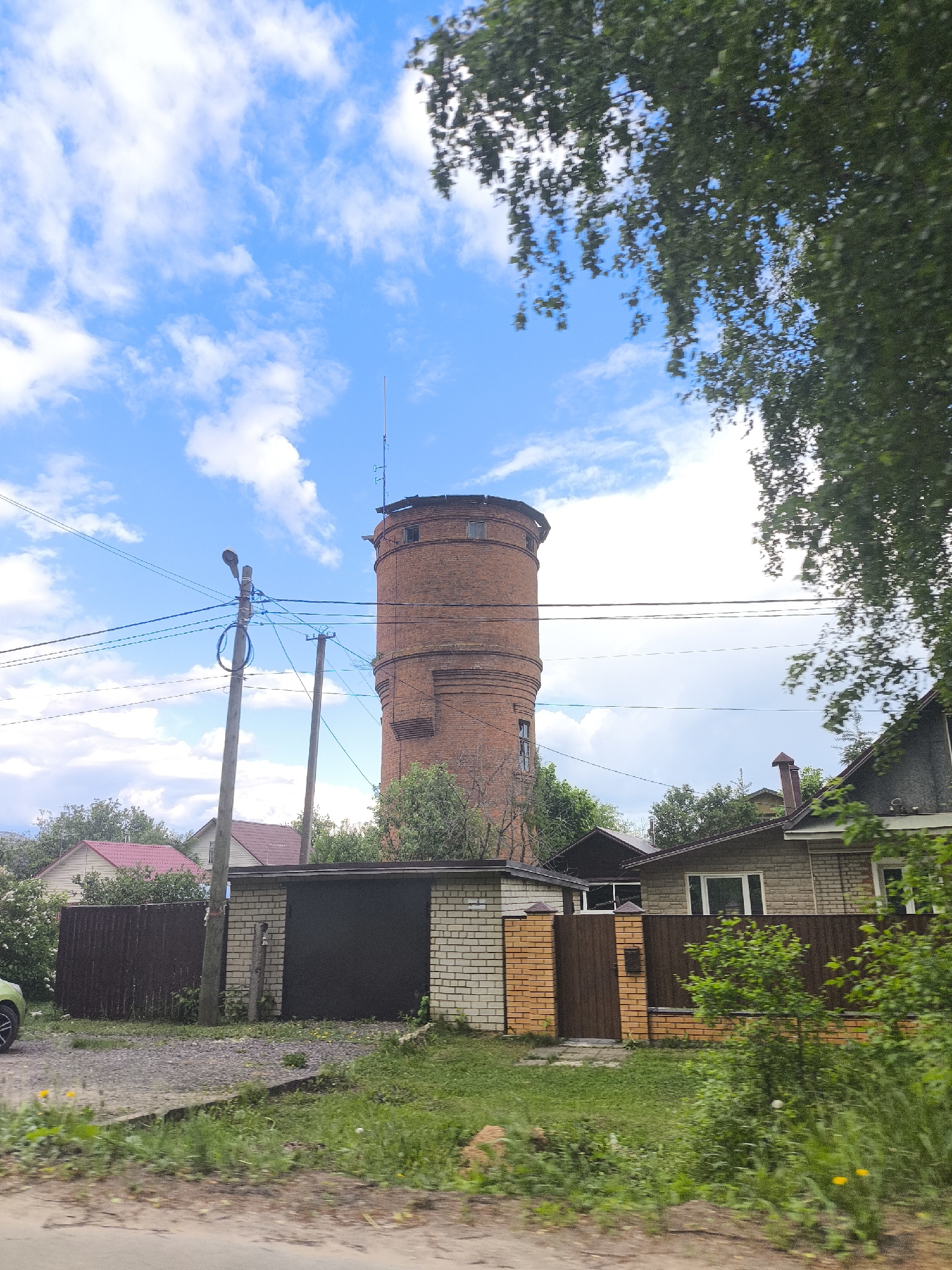 Unknown witness documents rural journey with Soviet symbols, spring blooms