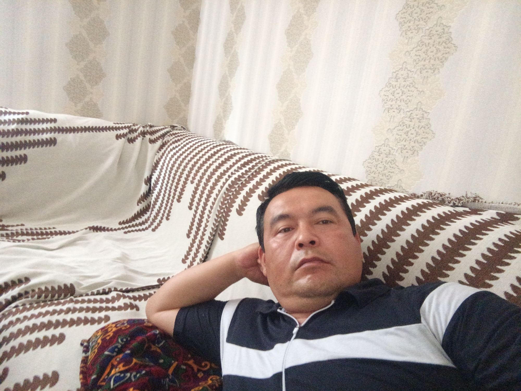 A quiet afternoon at home in Hakkulabad, Uzbekistan