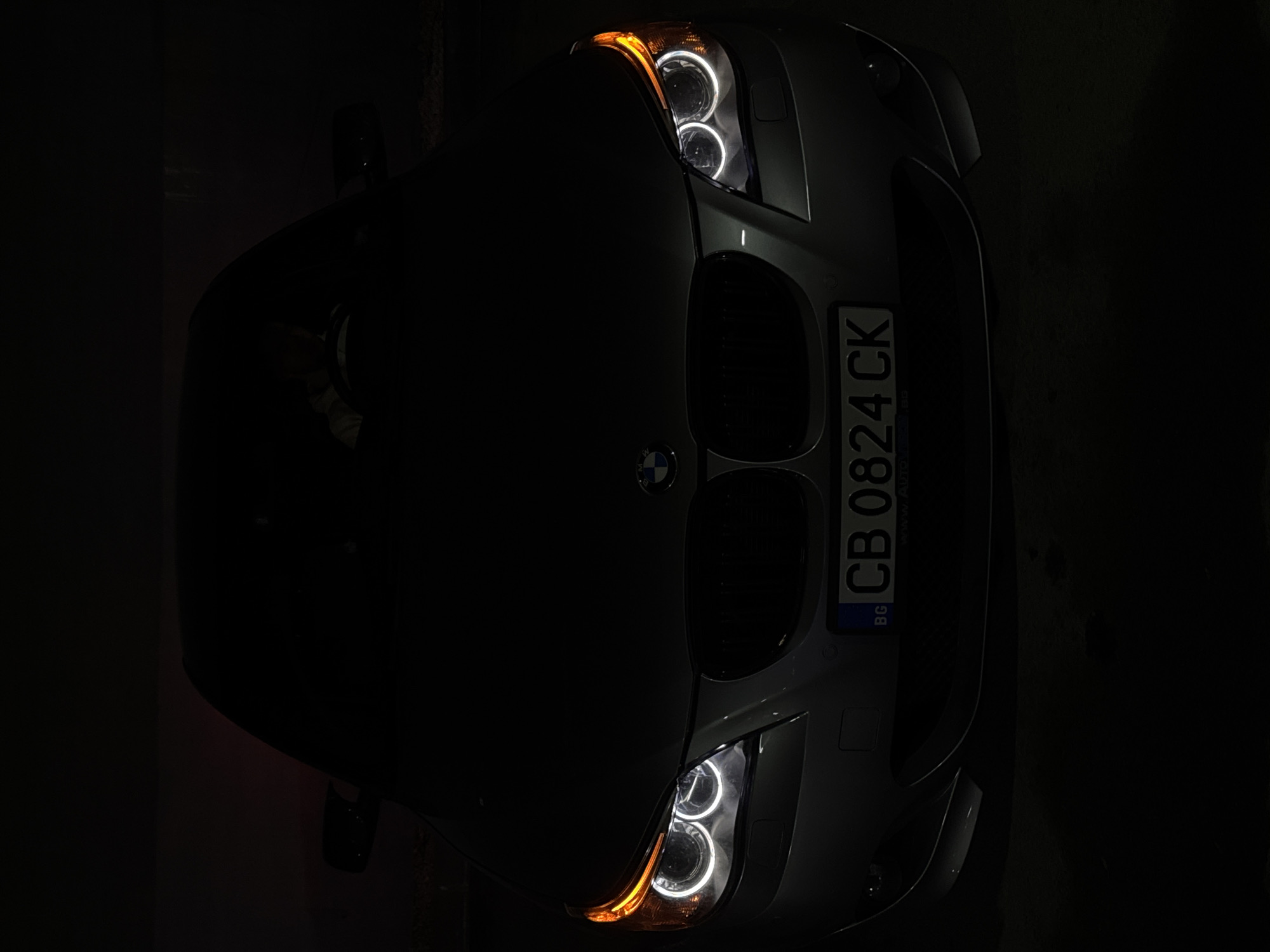 BMW photographed parked with lights on in Smolyan, Bulgaria