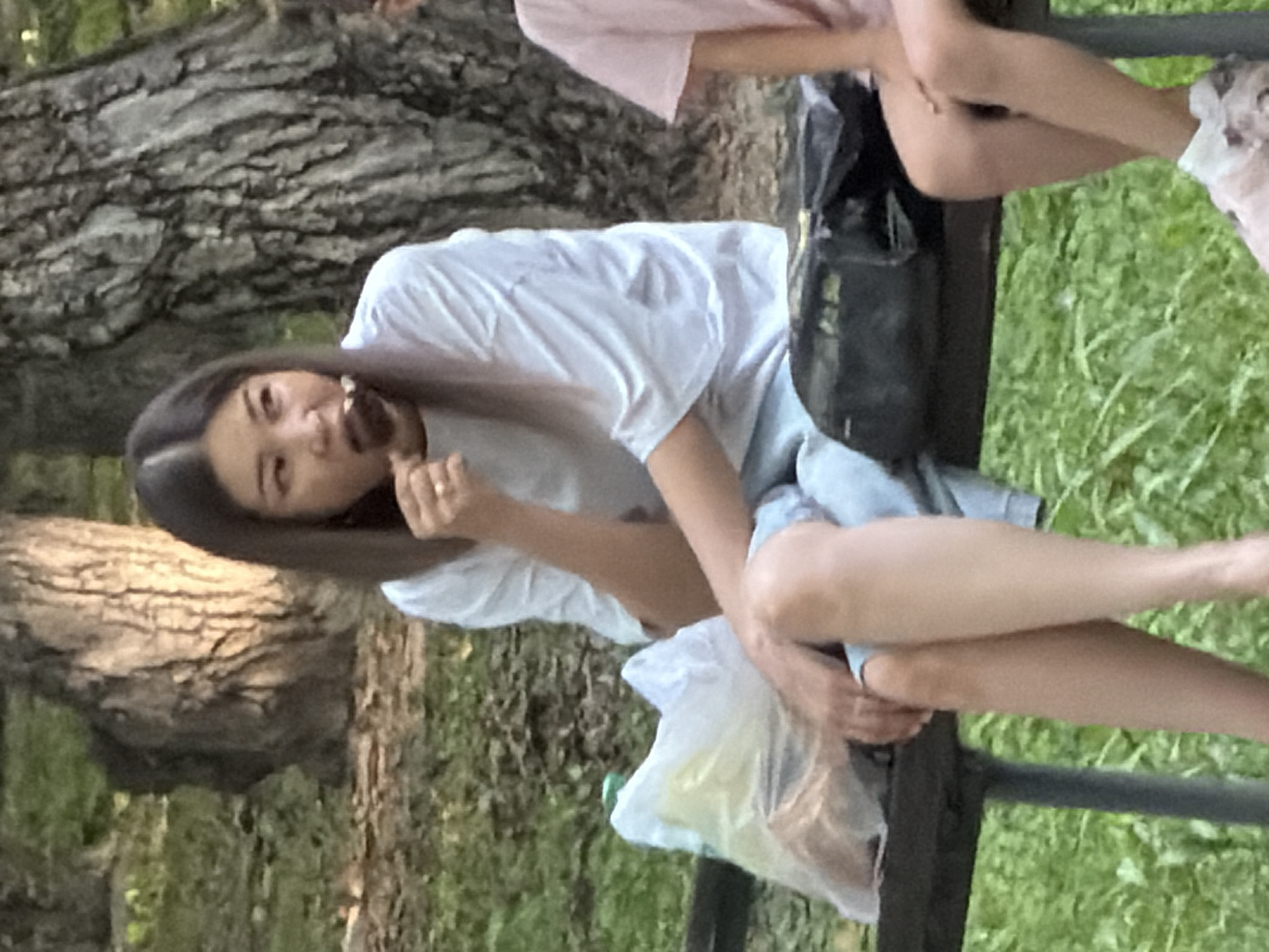 Casual afternoon in an urban park, walking and hanging out.