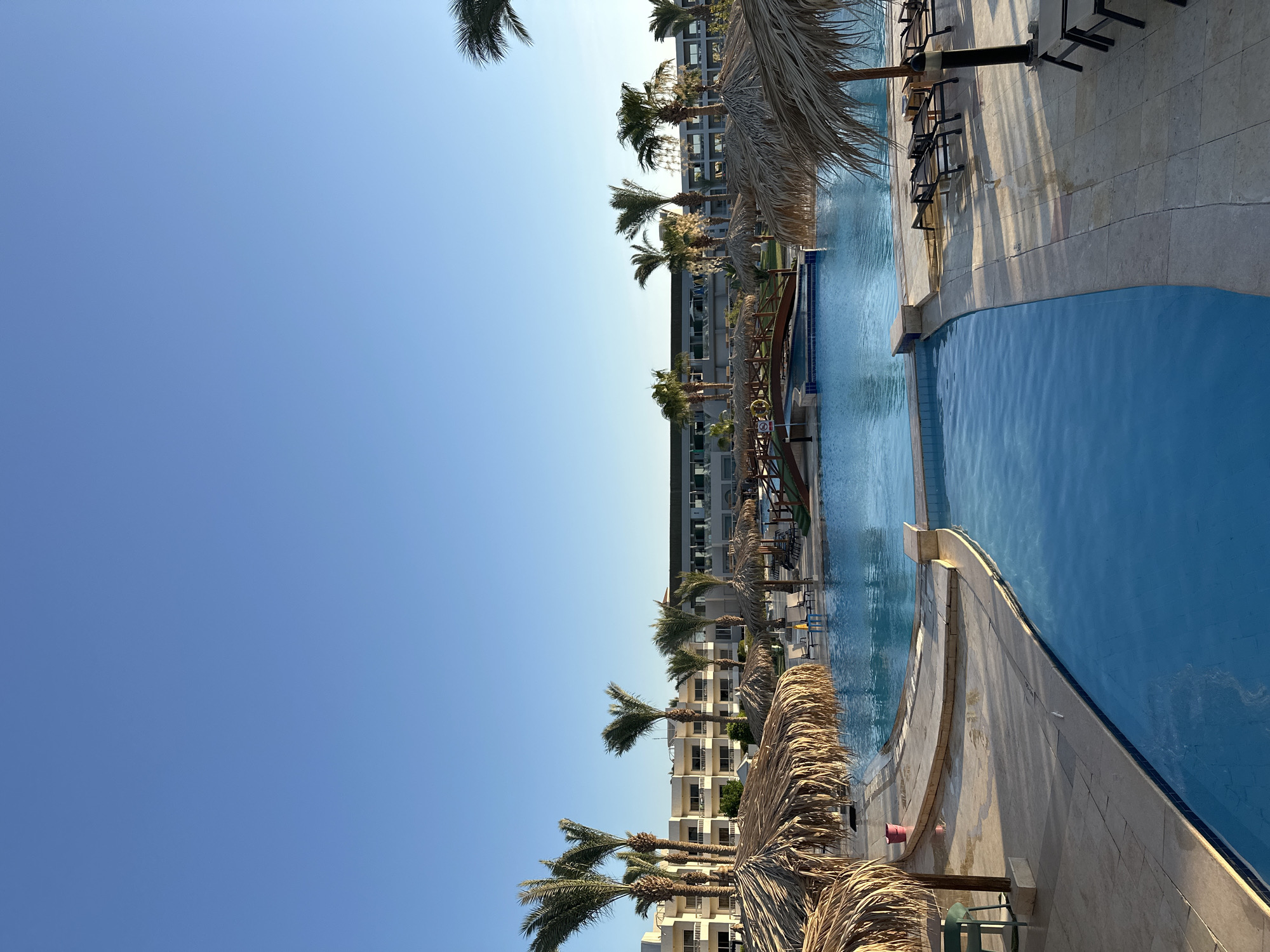 Hurghada resort pool on a clear afternoon