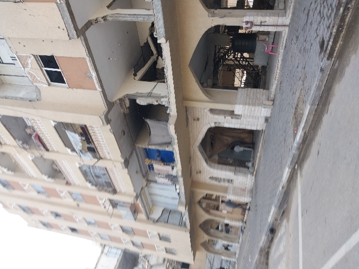 Extensive building damage documented across Khan Yunis during afternoon hours