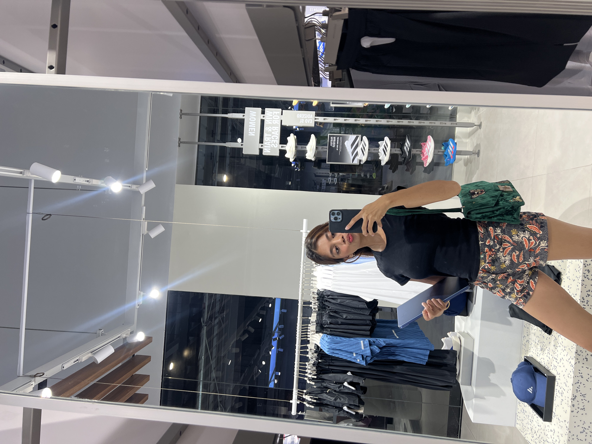 Woman shops Adidas, explores Azuela High Street in Davao City