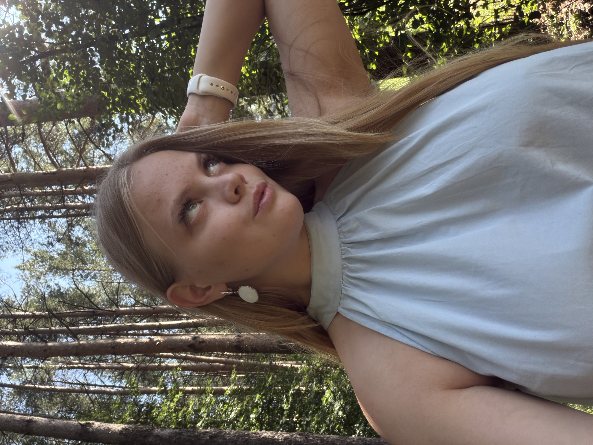 Playful selfie session in a pine forest near Izhevsk