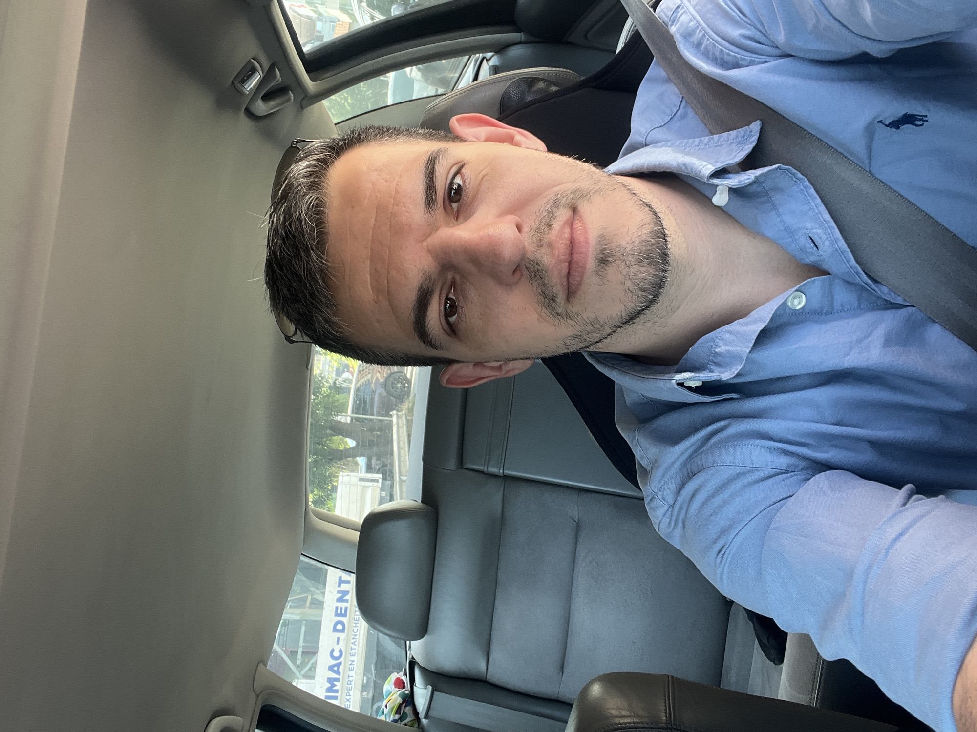 Driver takes selfie in car in Sofia, Bulgaria
