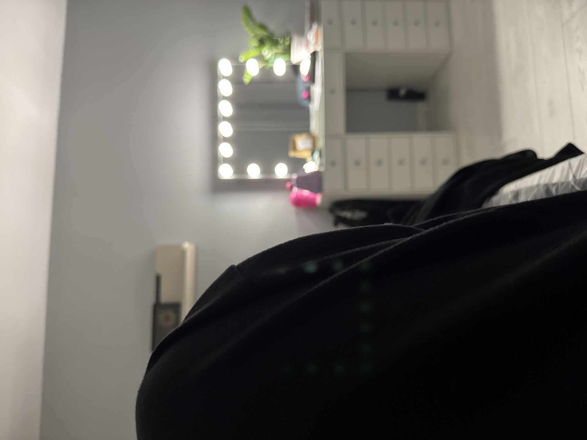 Bedroom interior with vanity mirror documented in Sofia