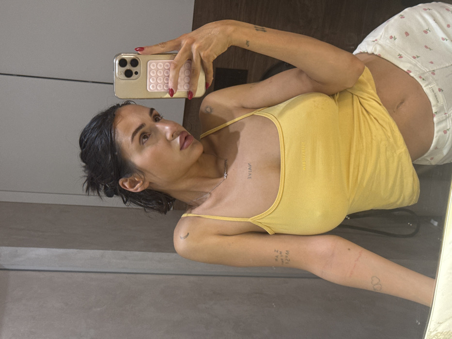 Woman Takes Mirror Selfies in Khimki Apartment