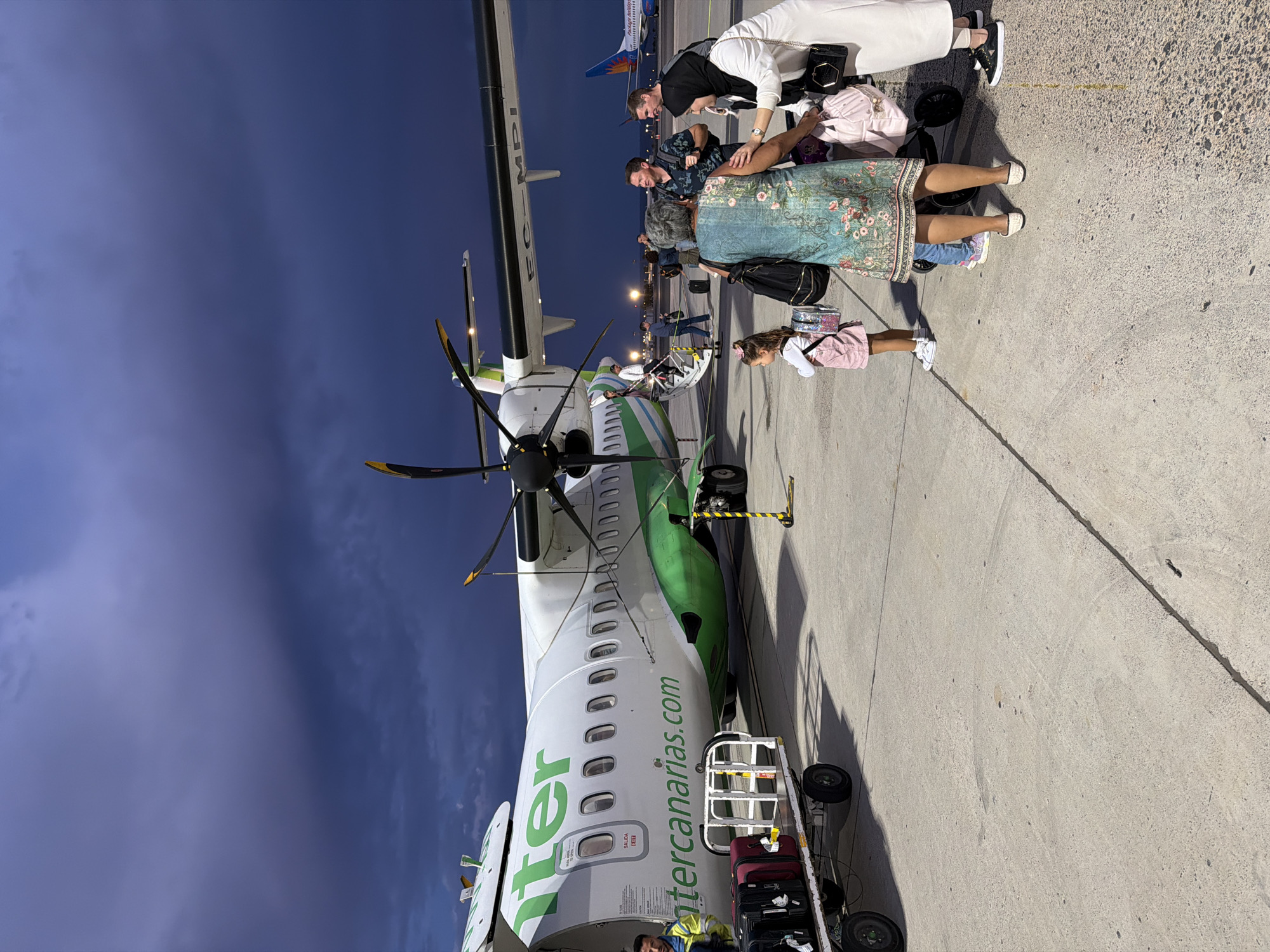 Turboprop aircraft spotted on evening tarmac in San Bartolomé