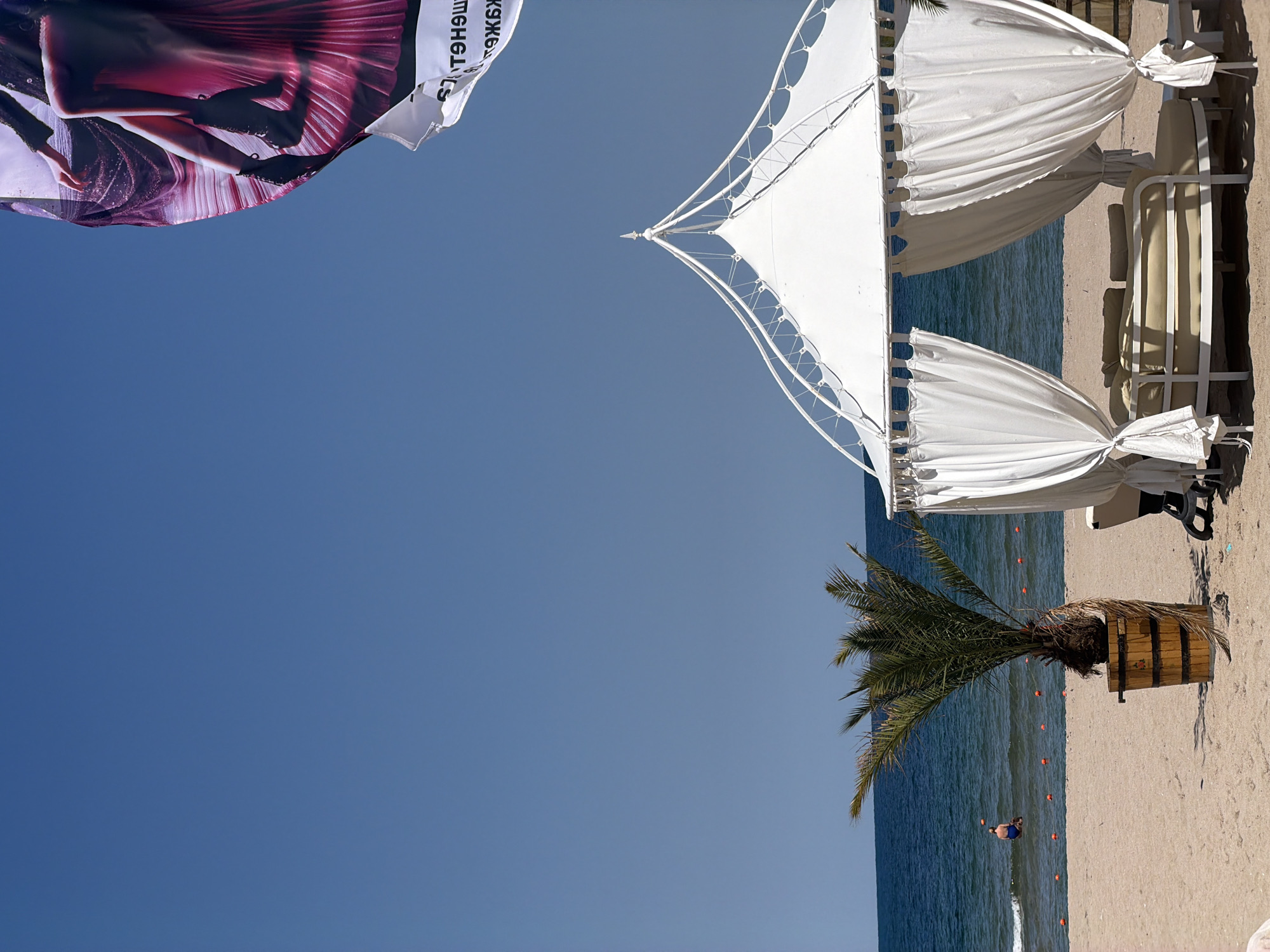 Shaded lounge gazebo on a sunny Lozenets beach